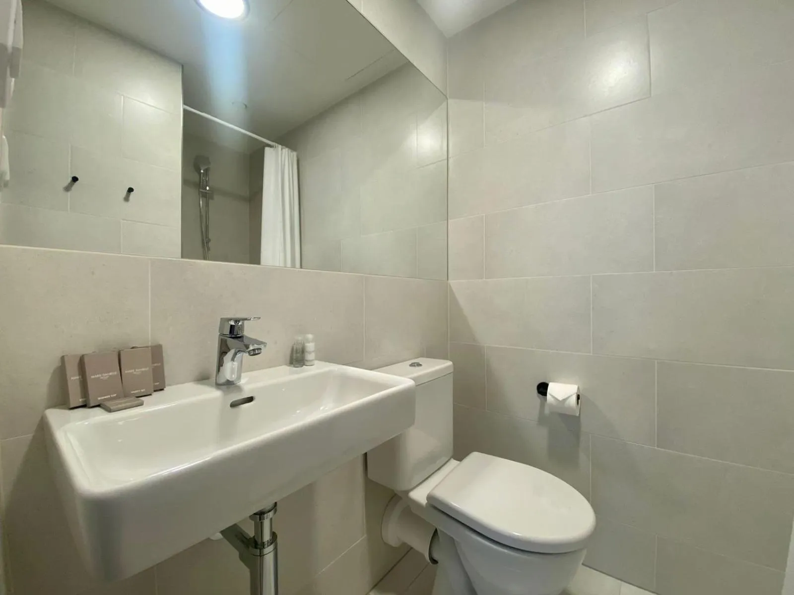 Bathroom in Figaro Suites