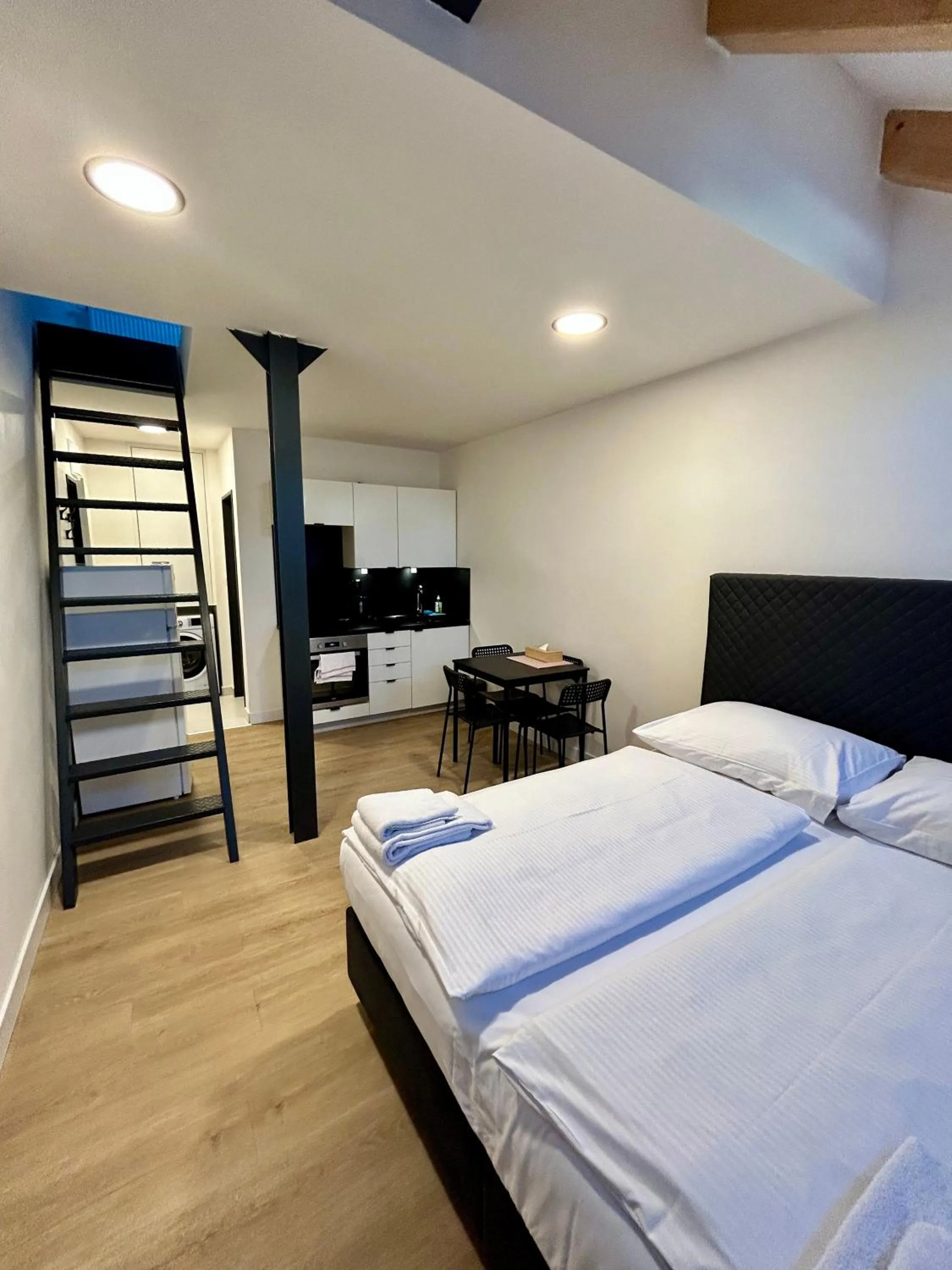 Bed in Figaro Suites