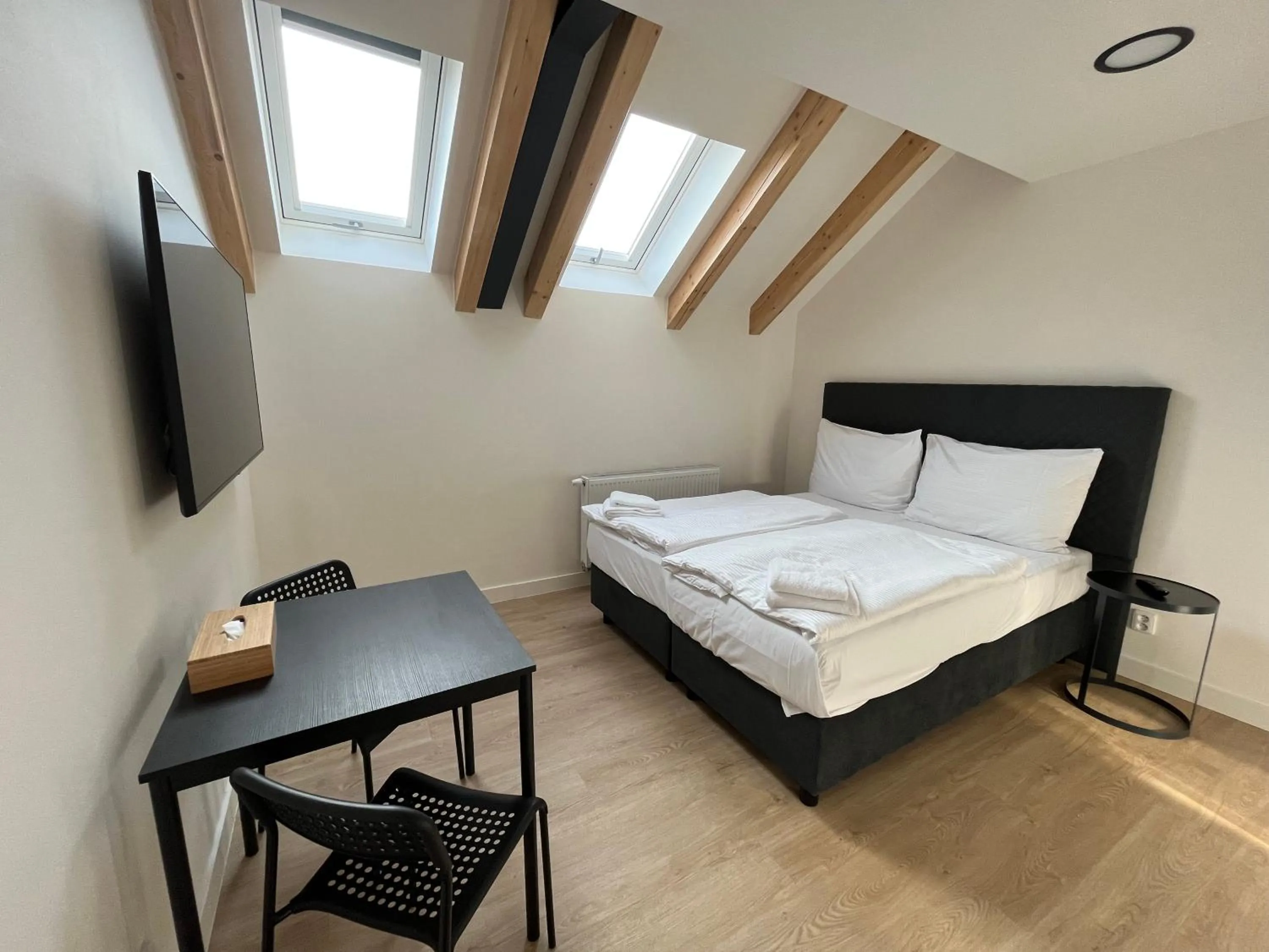 Bed in Figaro Suites