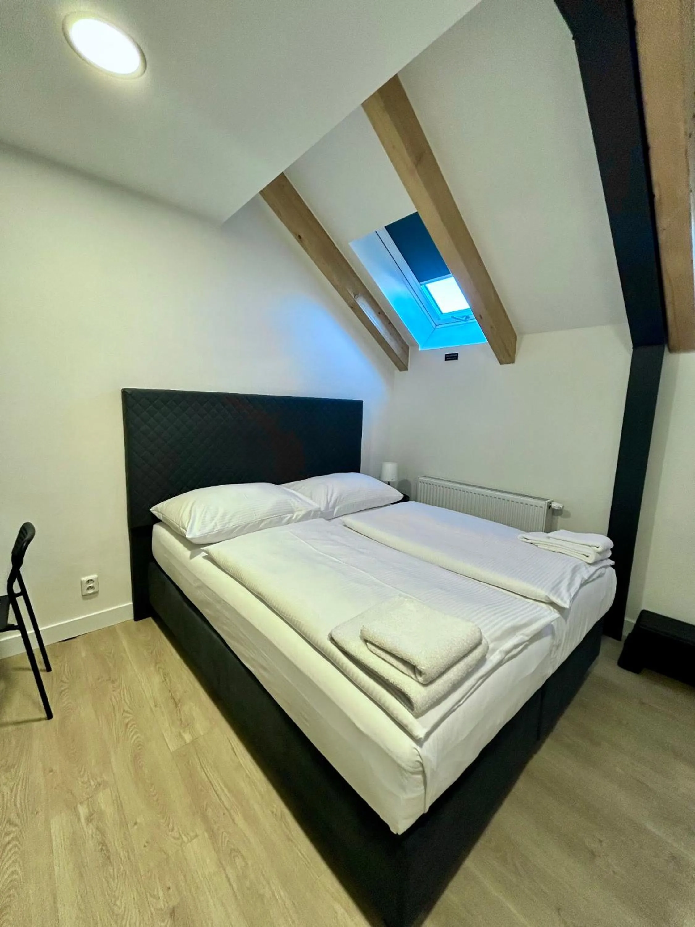 Bed in Figaro Suites