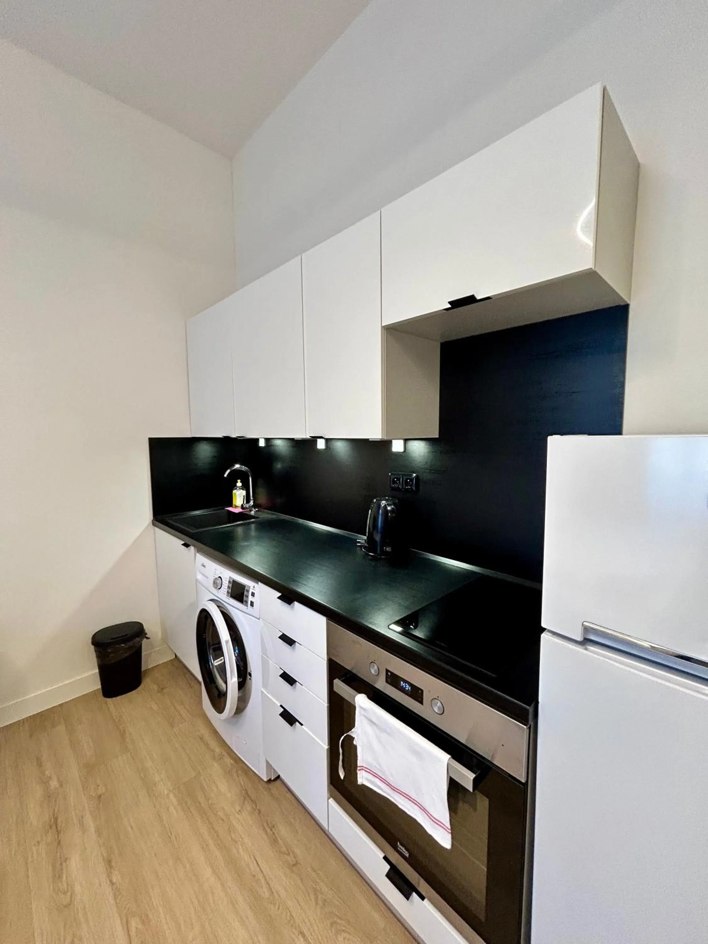 Kitchen or kitchenette in Figaro Suites