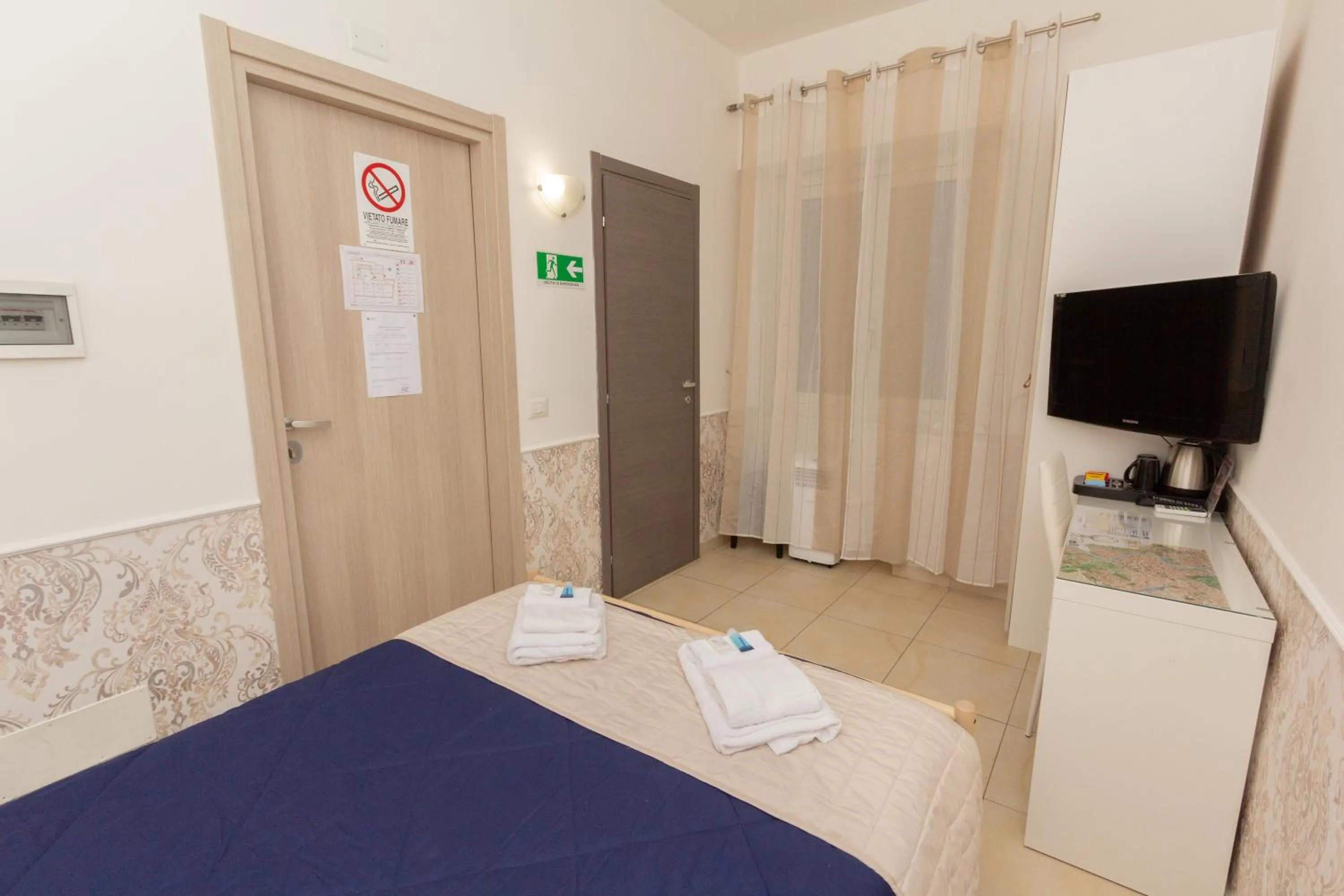 Bedroom, Bed in Aurelio Deluxe Rooms