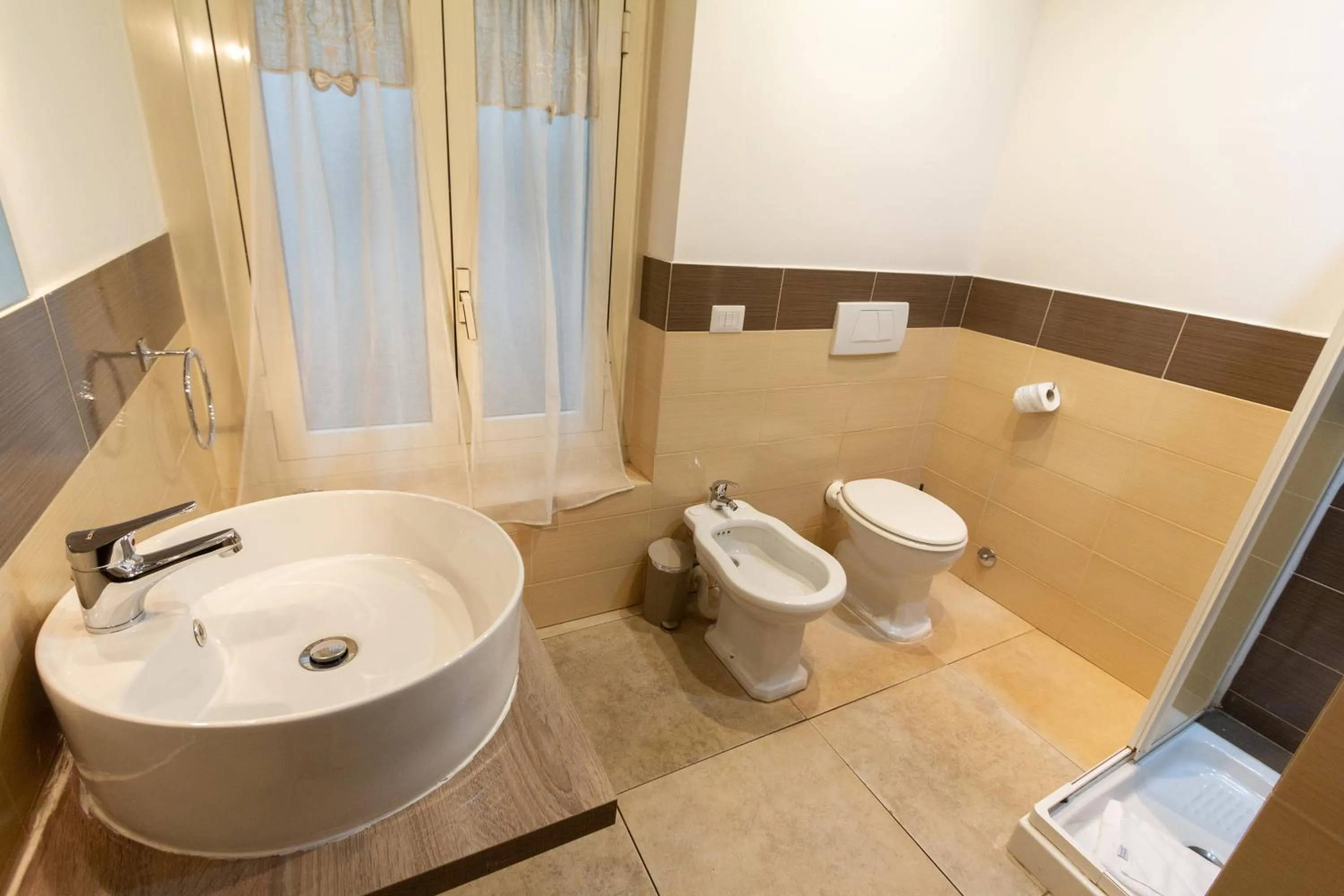 Bathroom in Aurelio Deluxe Rooms