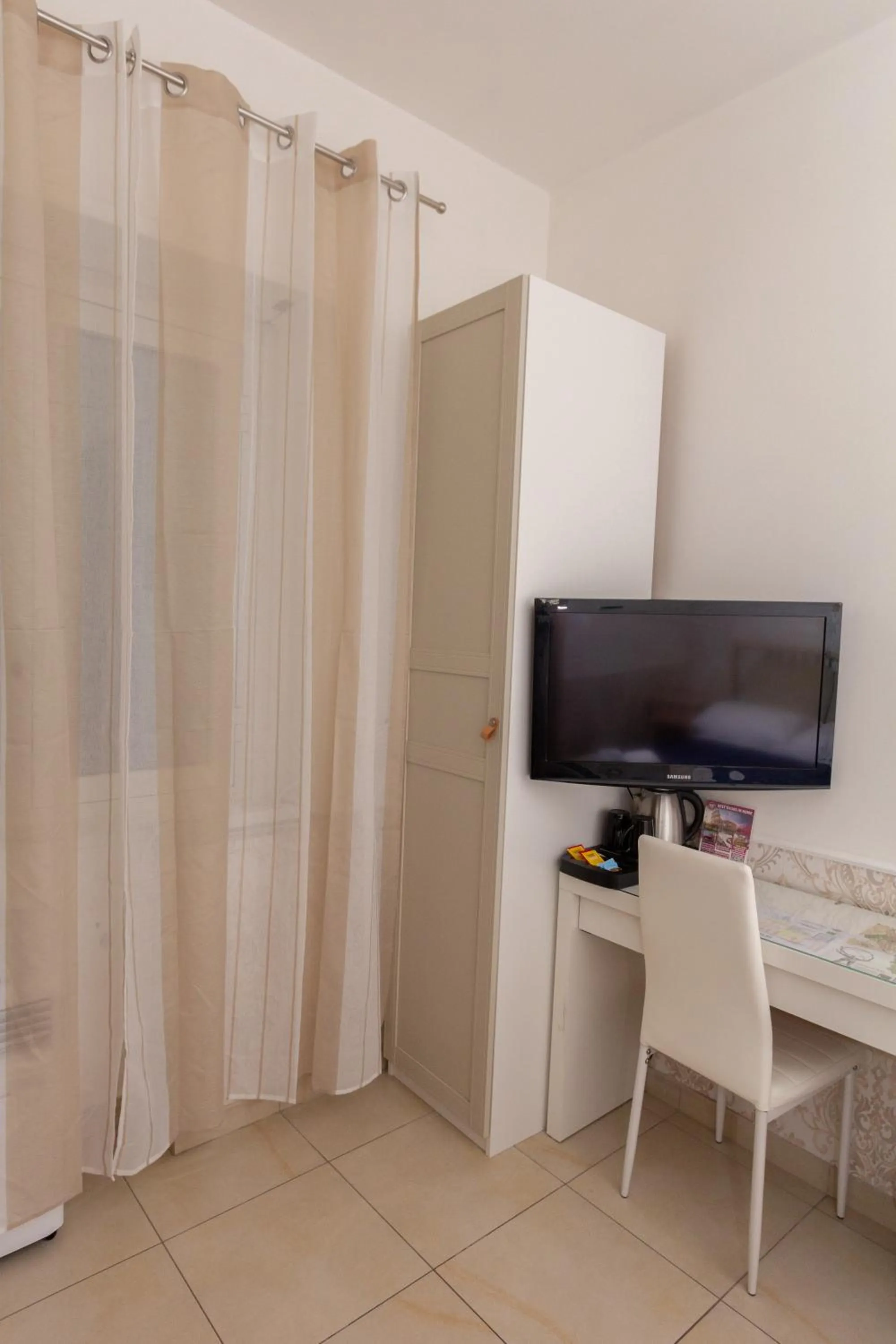 Bedroom in Aurelio Deluxe Rooms