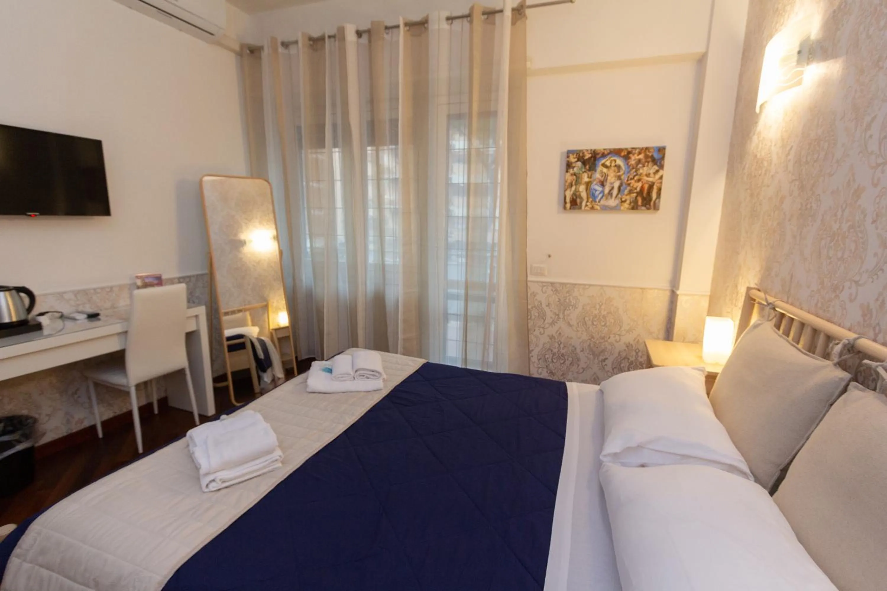 Bedroom, Bed in Aurelio Deluxe Rooms