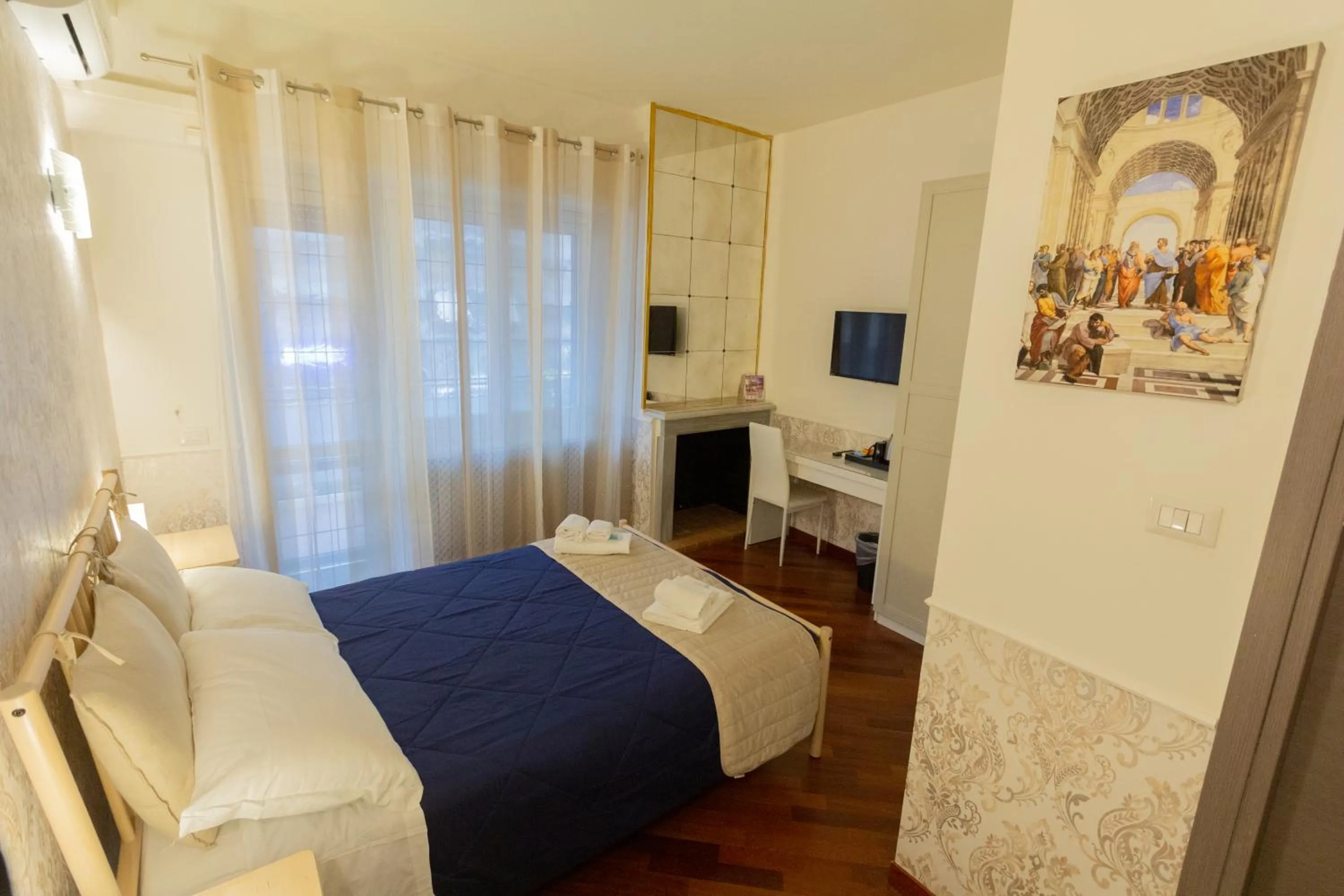 Bedroom, Bed in Aurelio Deluxe Rooms