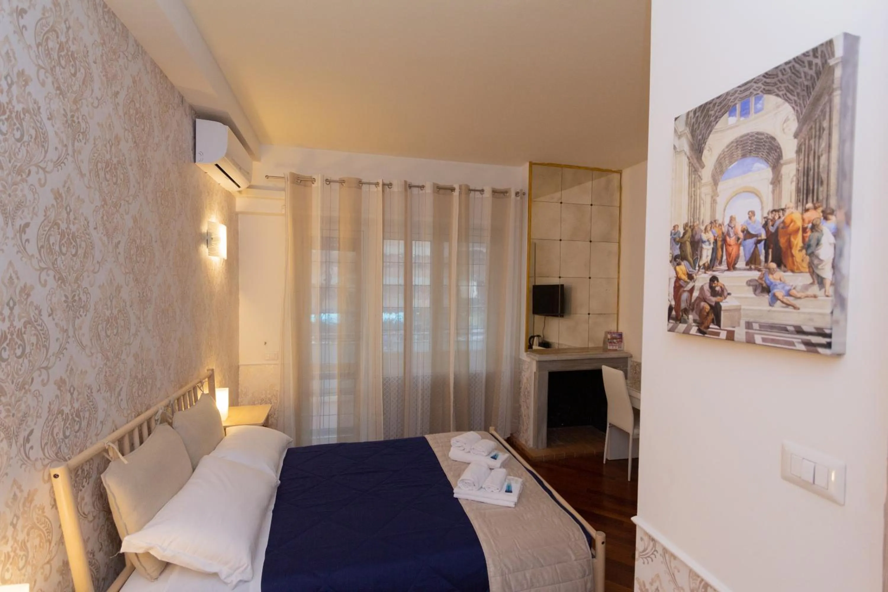 Bedroom, Bed in Aurelio Deluxe Rooms