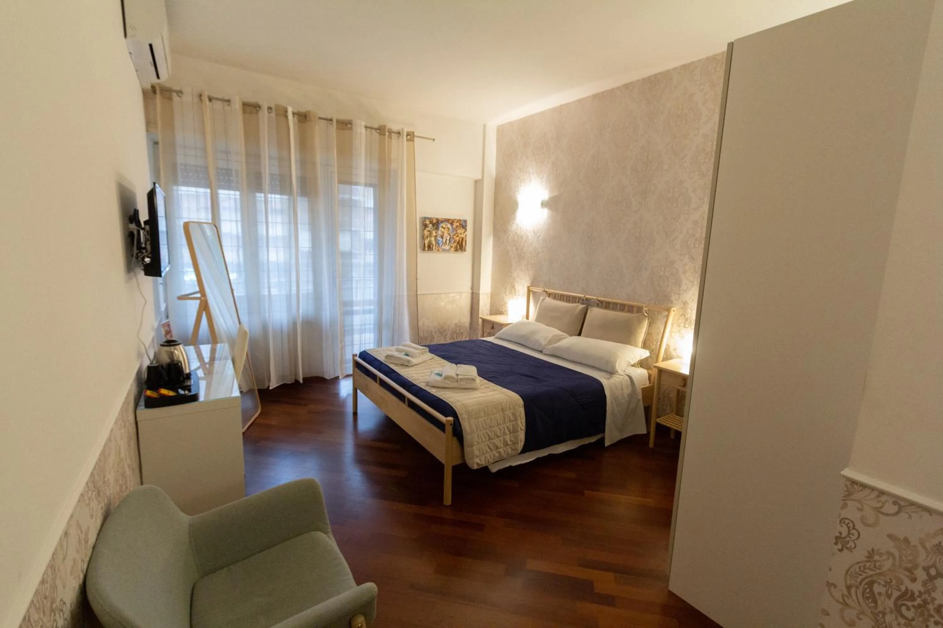 Bedroom, Bed in Aurelio Deluxe Rooms