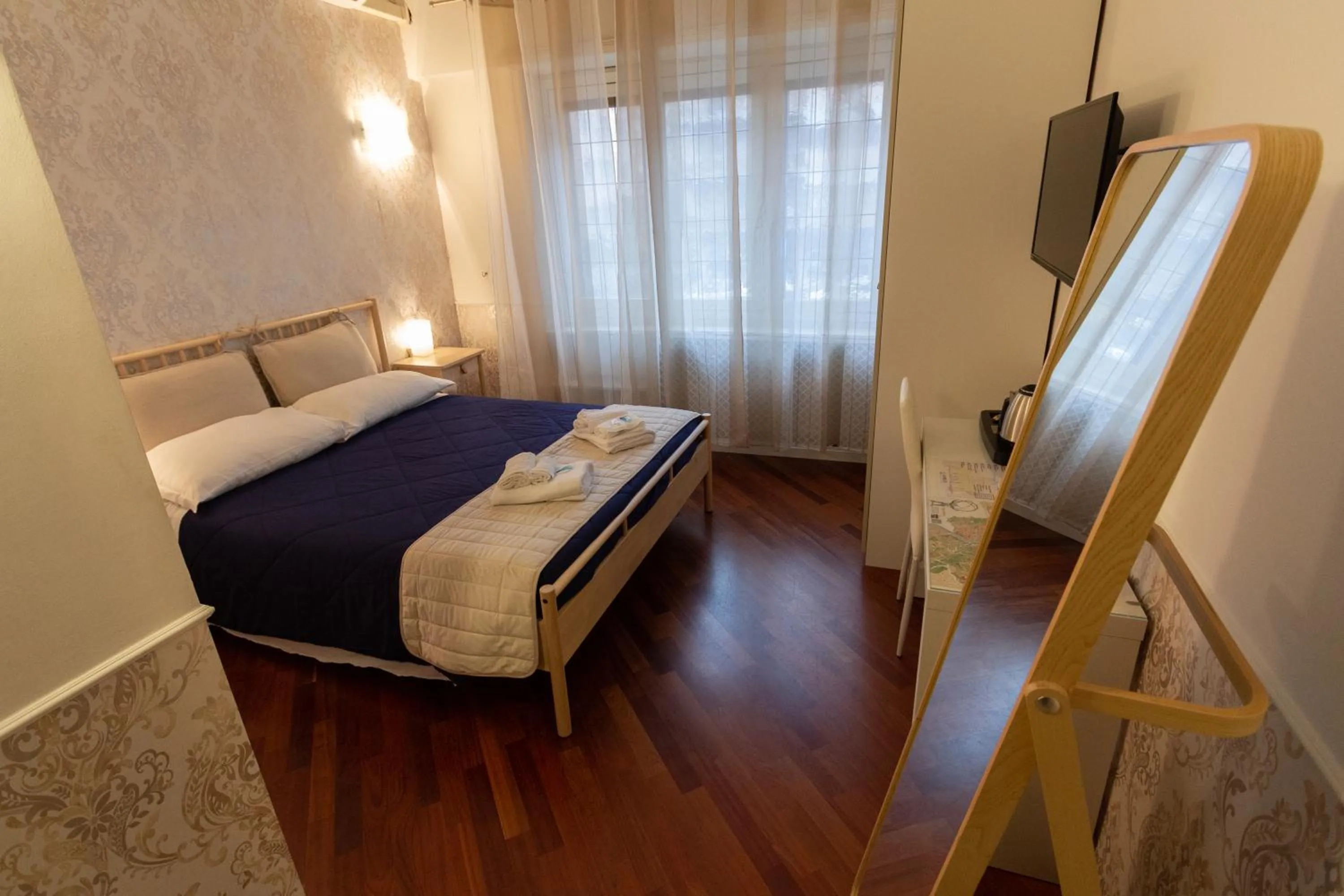 Bedroom, Bed in Aurelio Deluxe Rooms