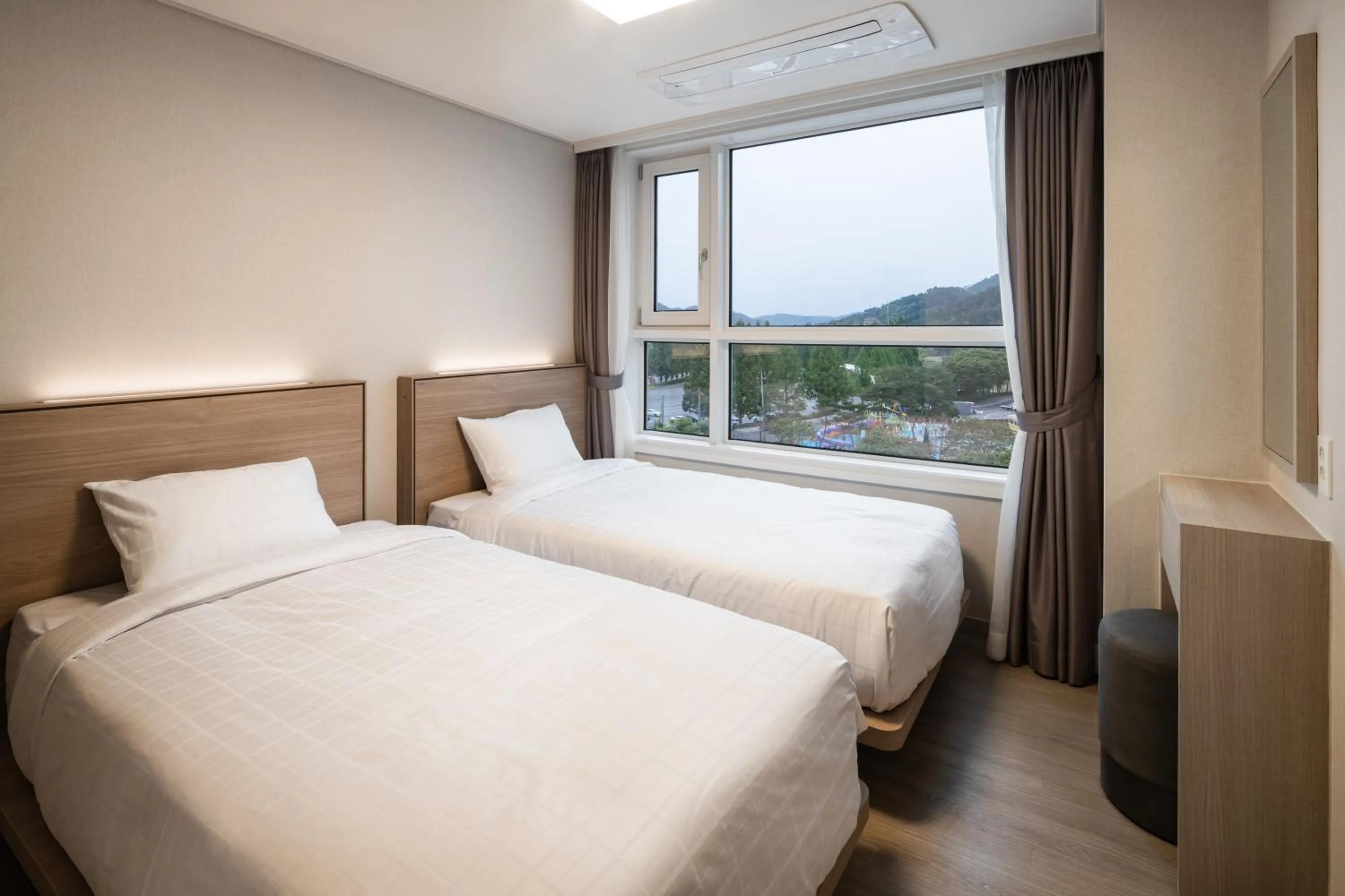 Bed in Kumho Hwasun Spa Resort