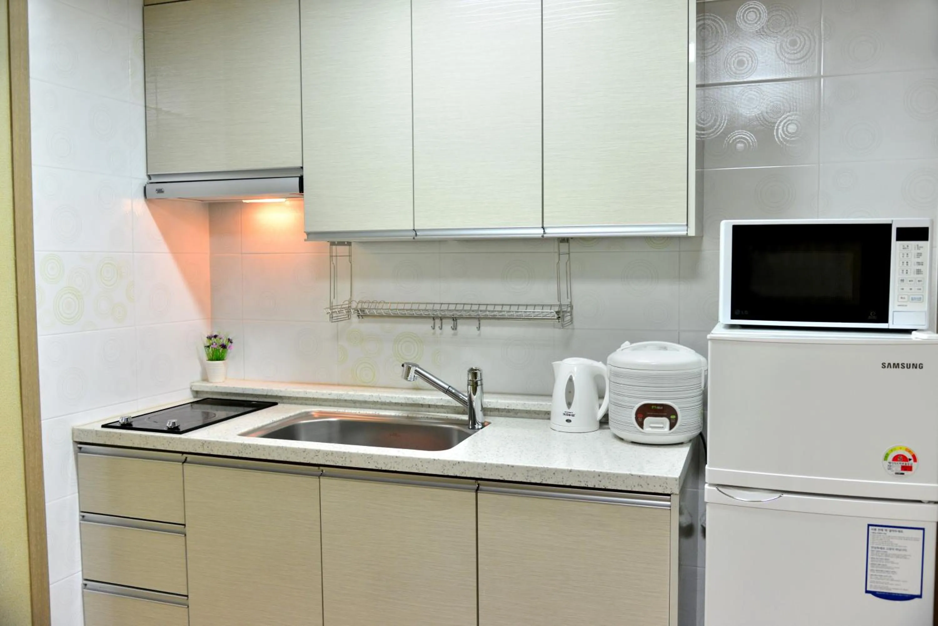 Kitchen or kitchenette in Jeju Bada Wi Olle Pension