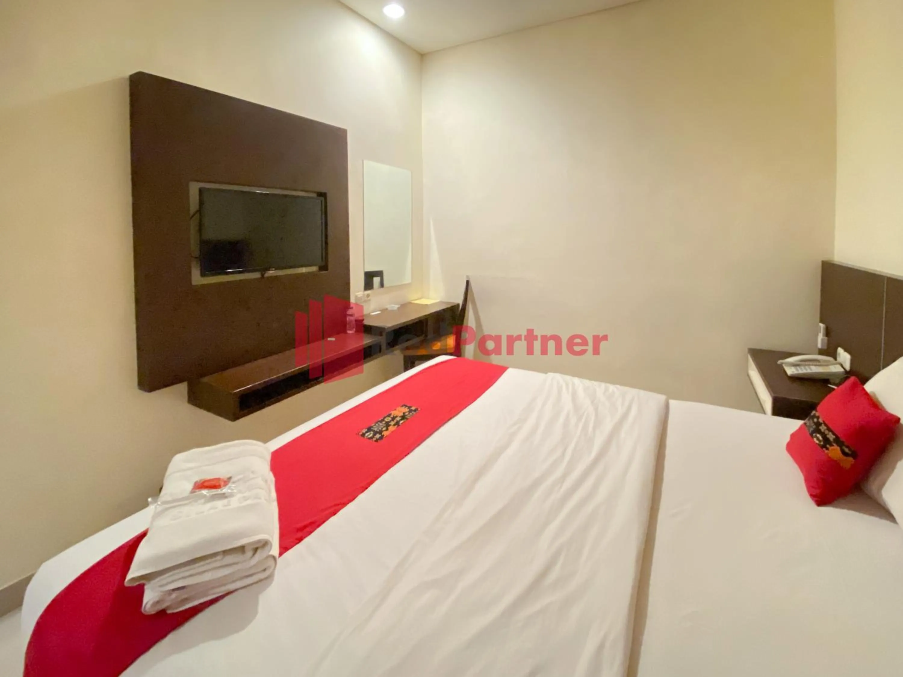 Bedroom in Hotel Alpha Makassar RedPartner