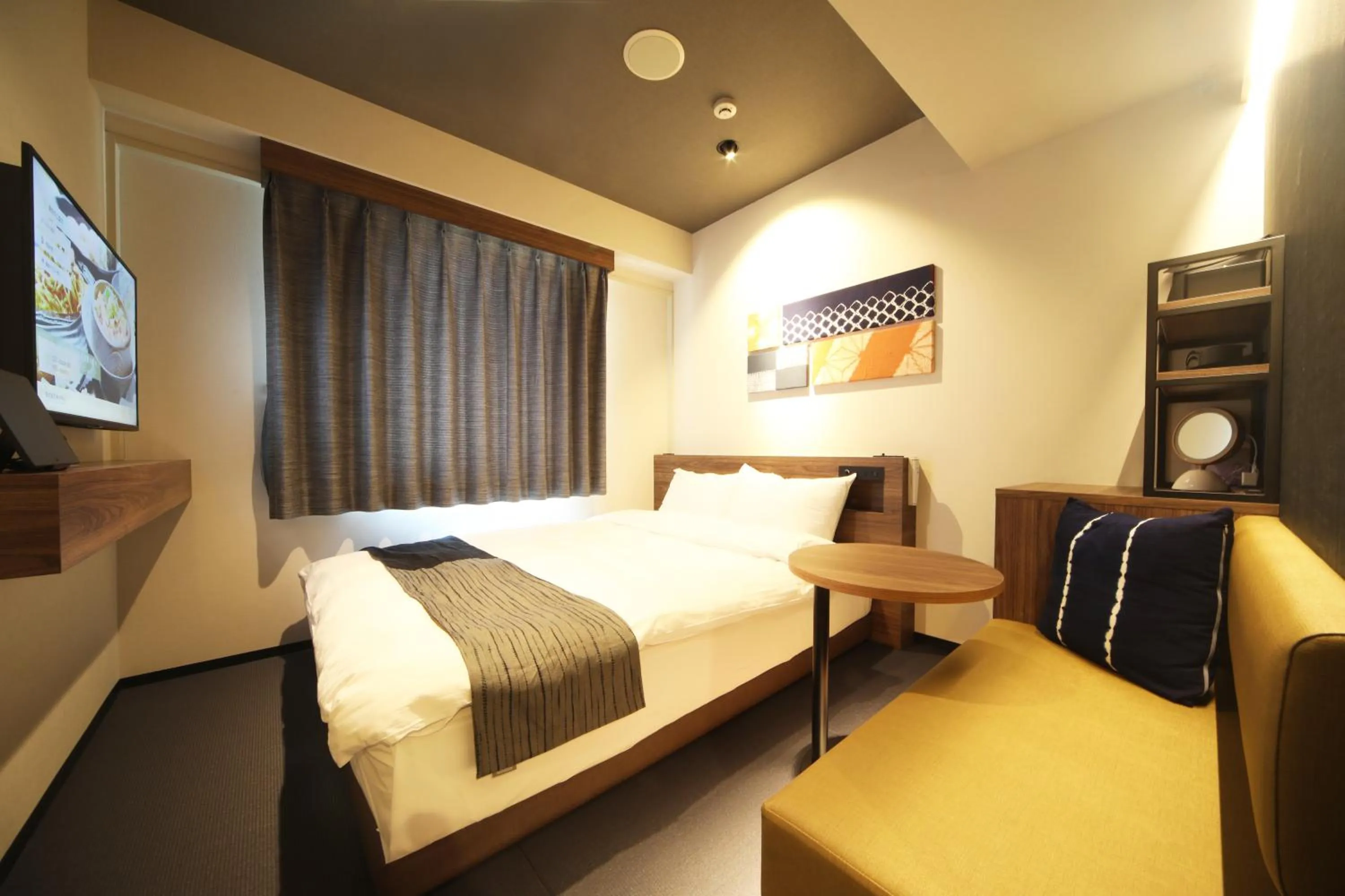 Photo of the whole room, Bed in -SPA RESORT- Nagoya Kasadera Hotel