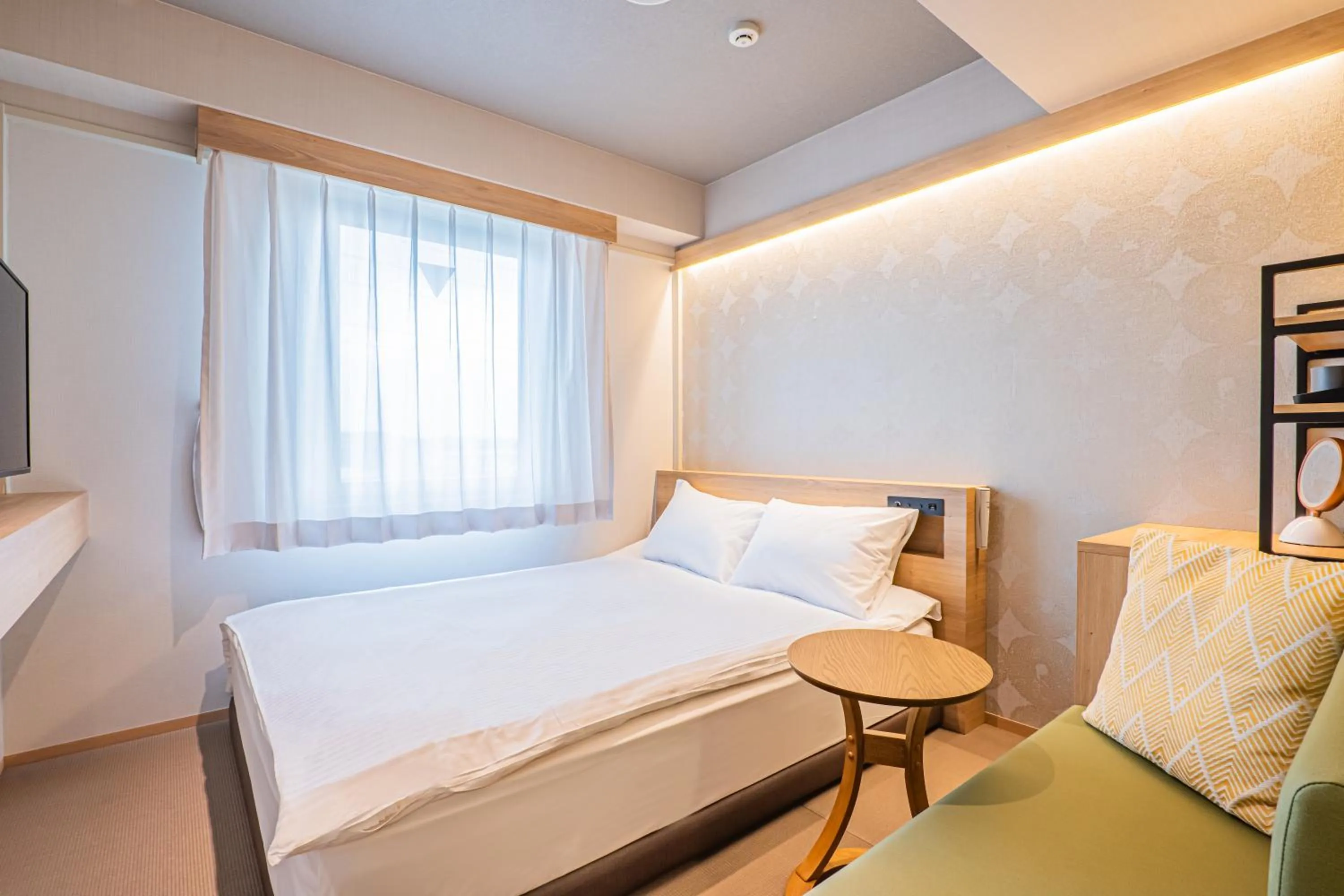 Photo of the whole room, Bed in -SPA RESORT- Nagoya Kasadera Hotel
