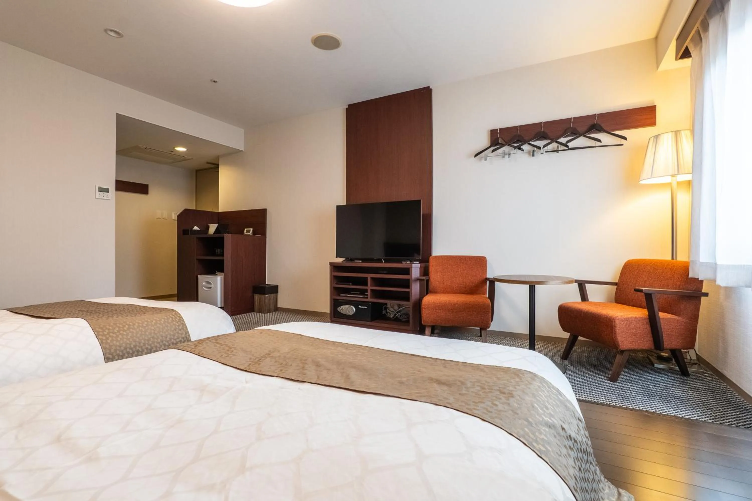 Photo of the whole room, Bed in -SPA RESORT- Nagoya Kasadera Hotel