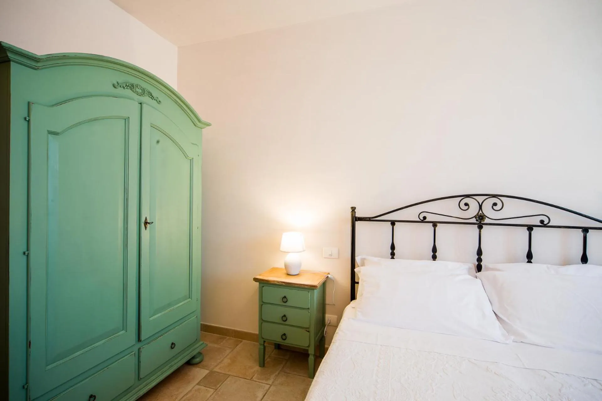 Bed in Trulli Nuova Aia Resort