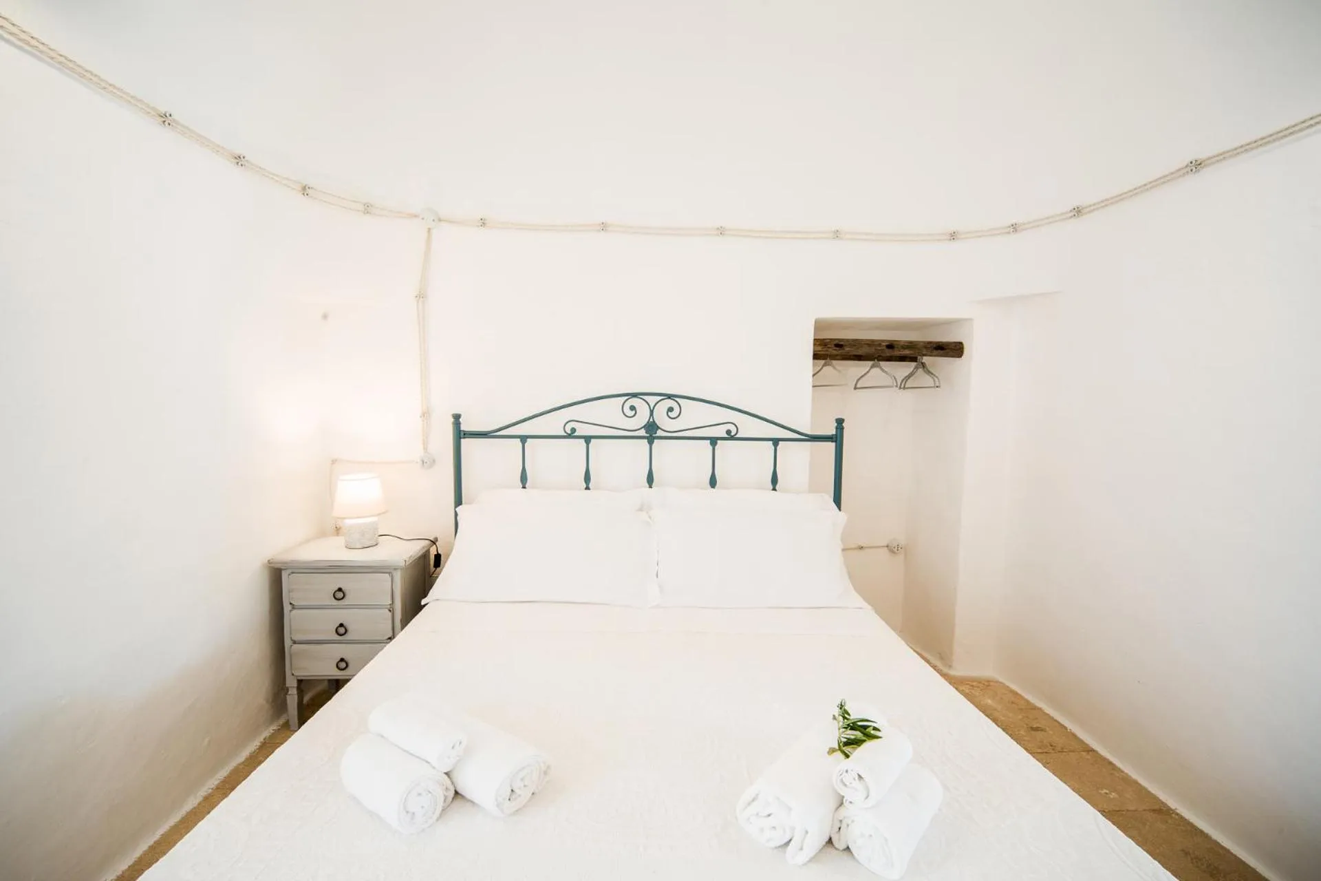 Bed in Trulli Nuova Aia Resort