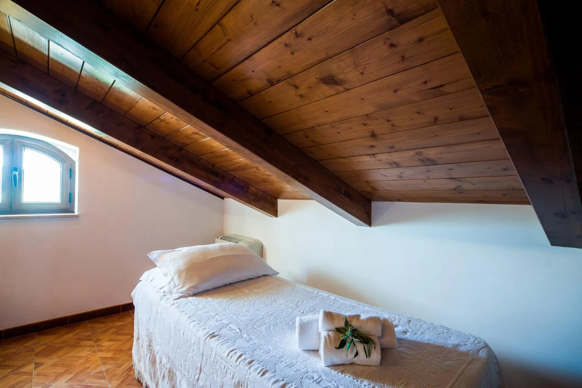 Bed in Trulli Nuova Aia Resort