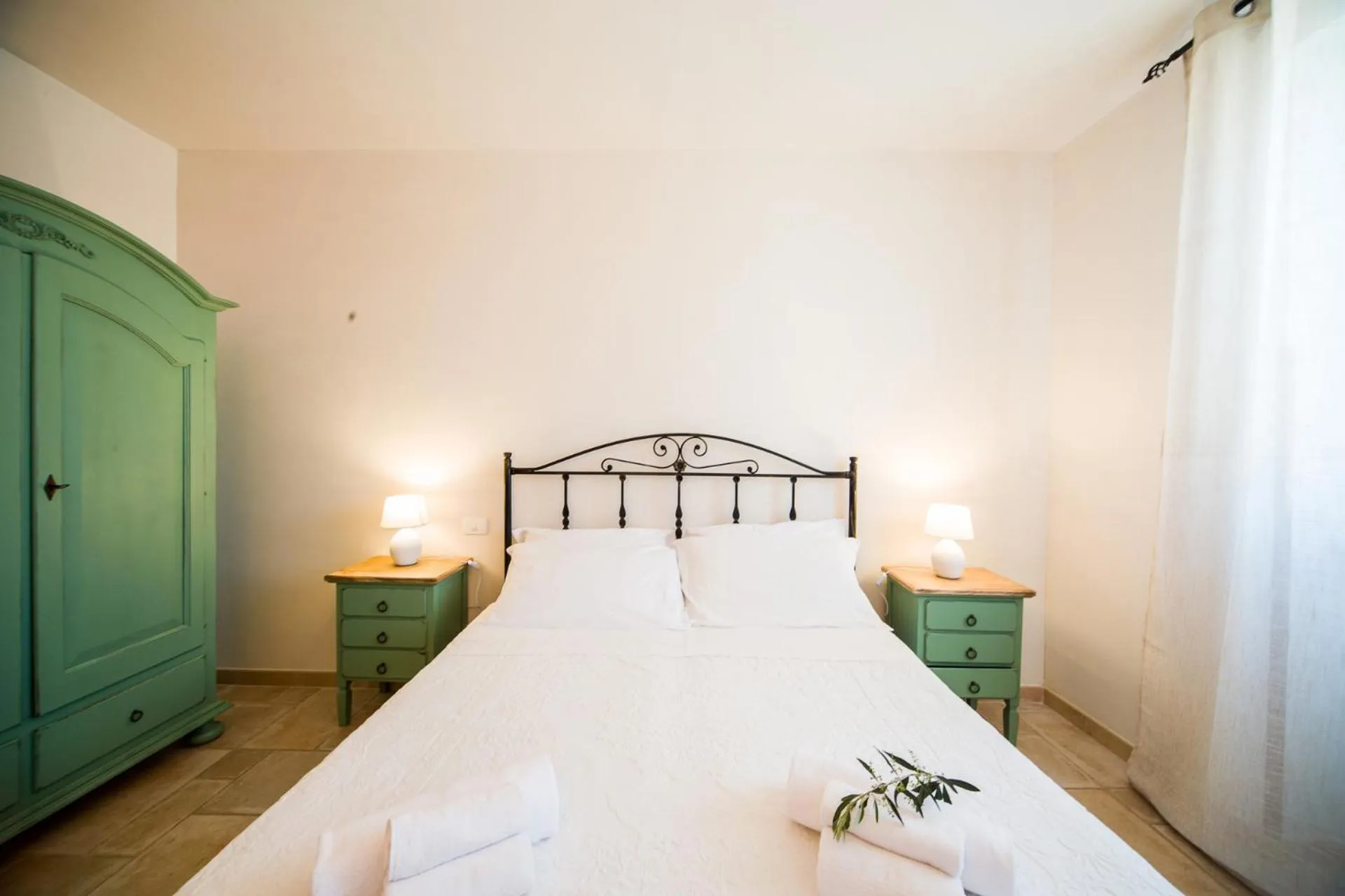 Bed in Trulli Nuova Aia Resort