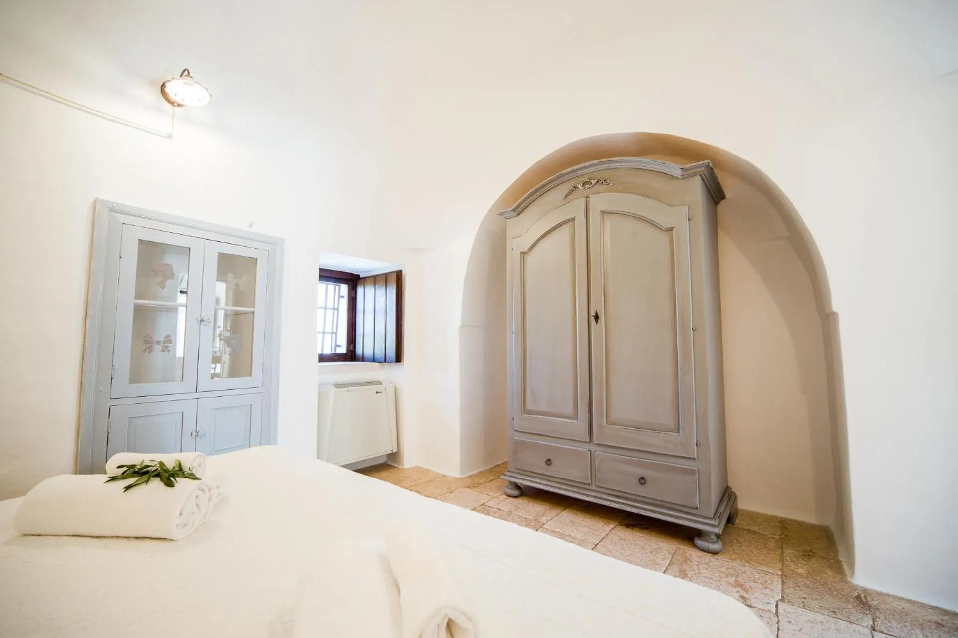 Bed in Trulli Nuova Aia Resort