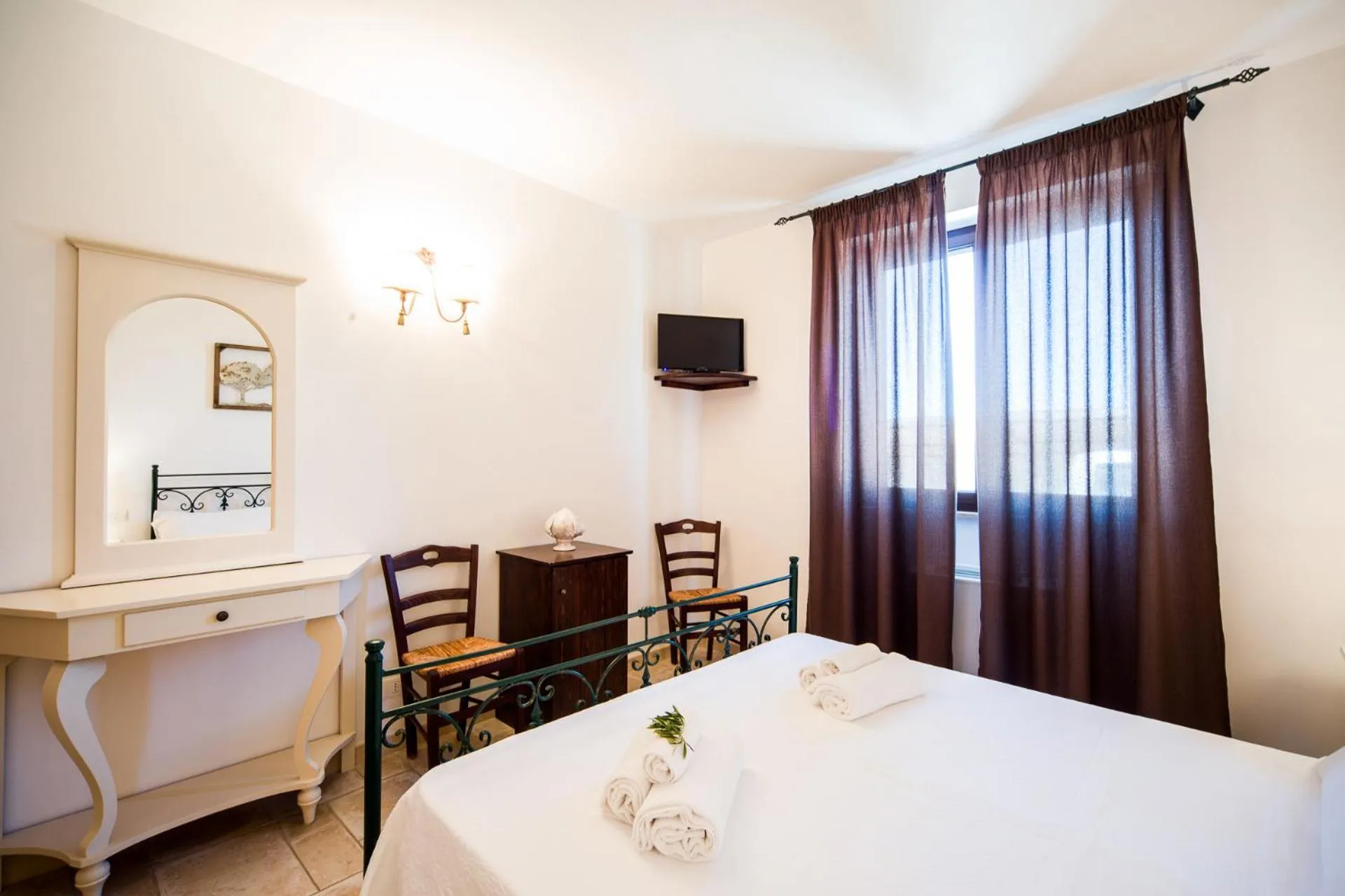 Bed in Trulli Nuova Aia Resort