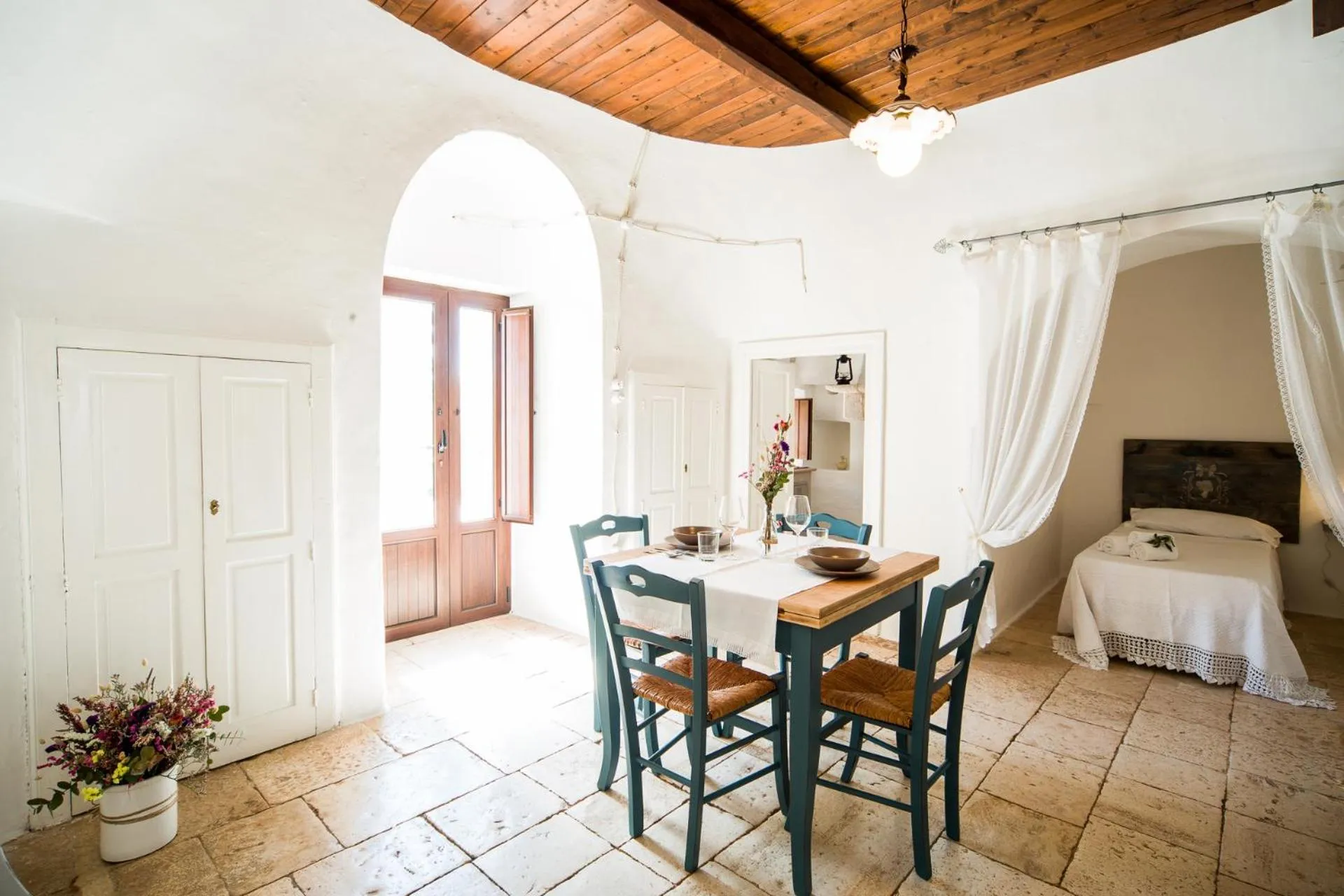 Bed in Trulli Nuova Aia Resort