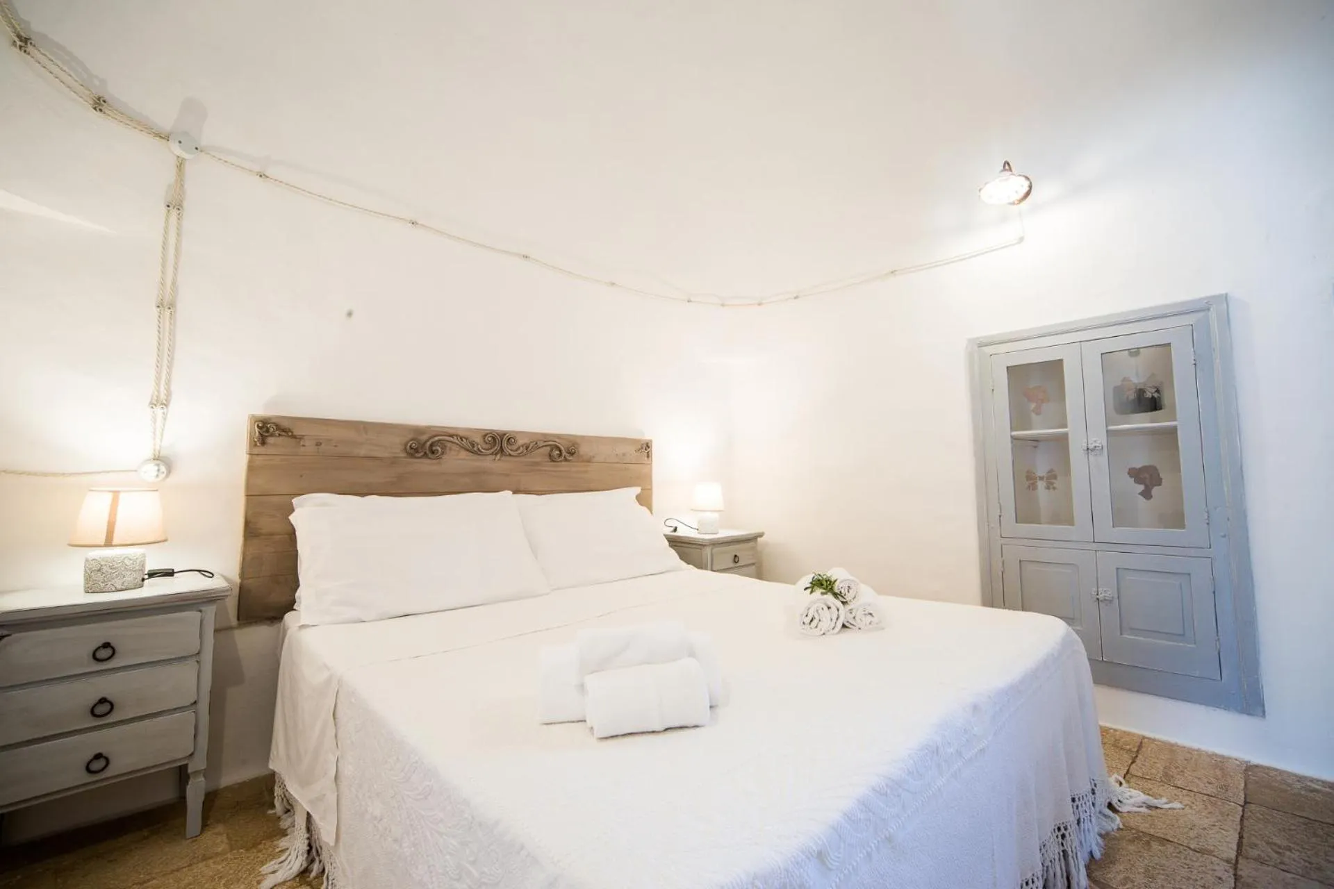 Bed in Trulli Nuova Aia Resort