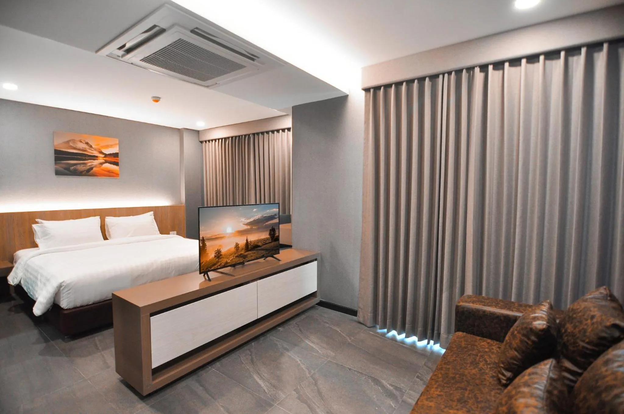 Living room, Bed in The S Block Condotel