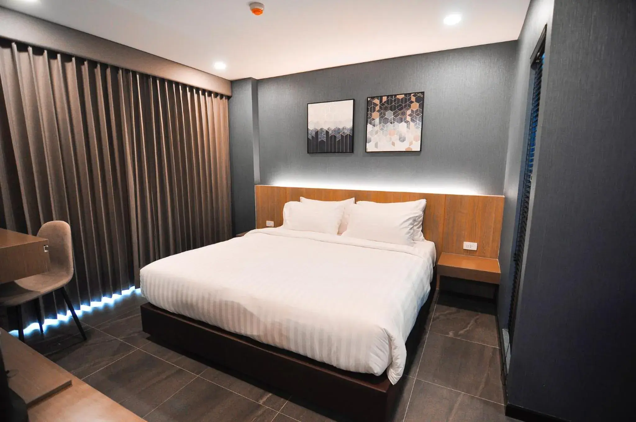 Bed in The S Block Condotel Bed in The S Block Condotel