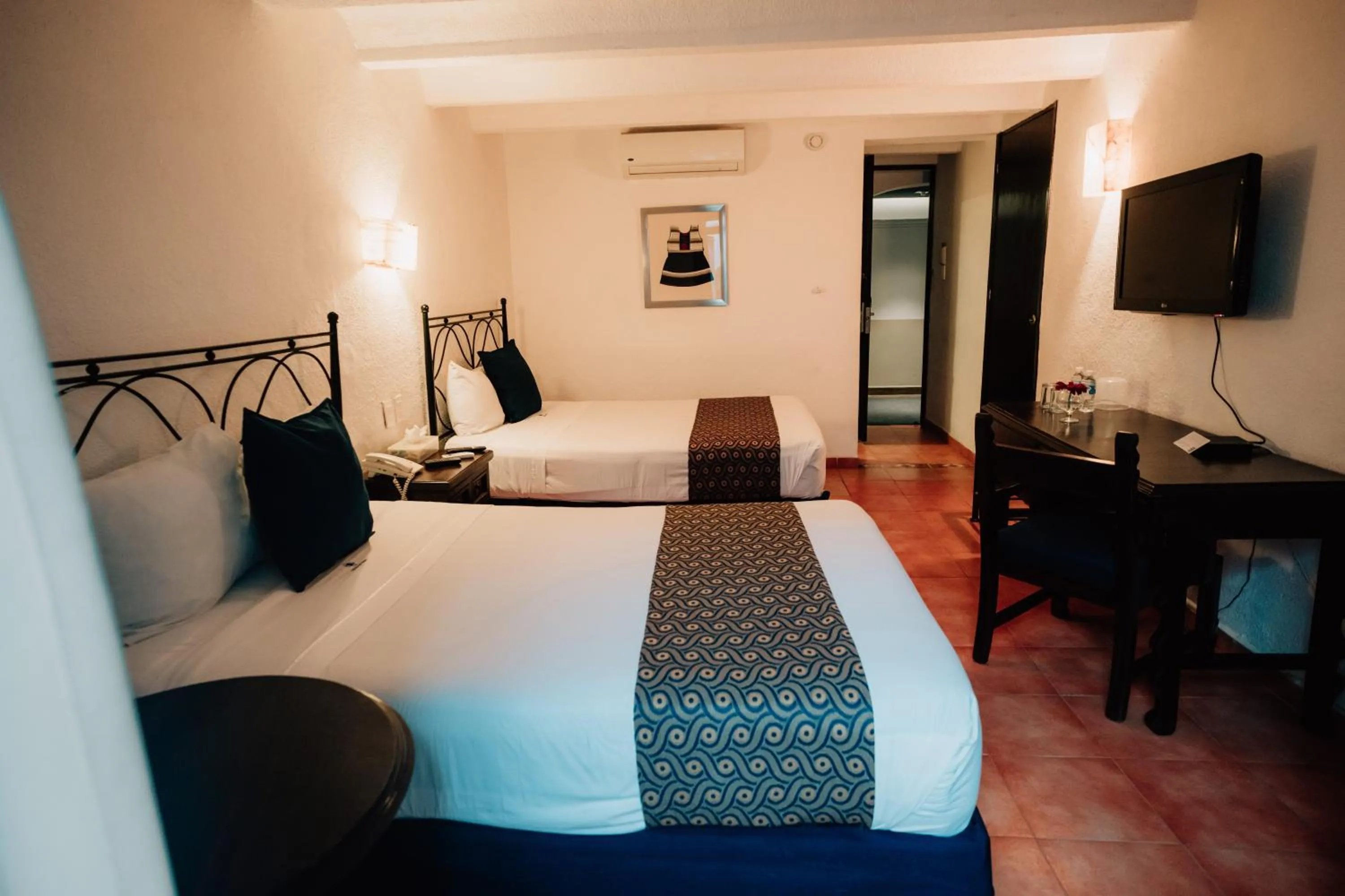 Bed in Hotel San Pedro Puebla