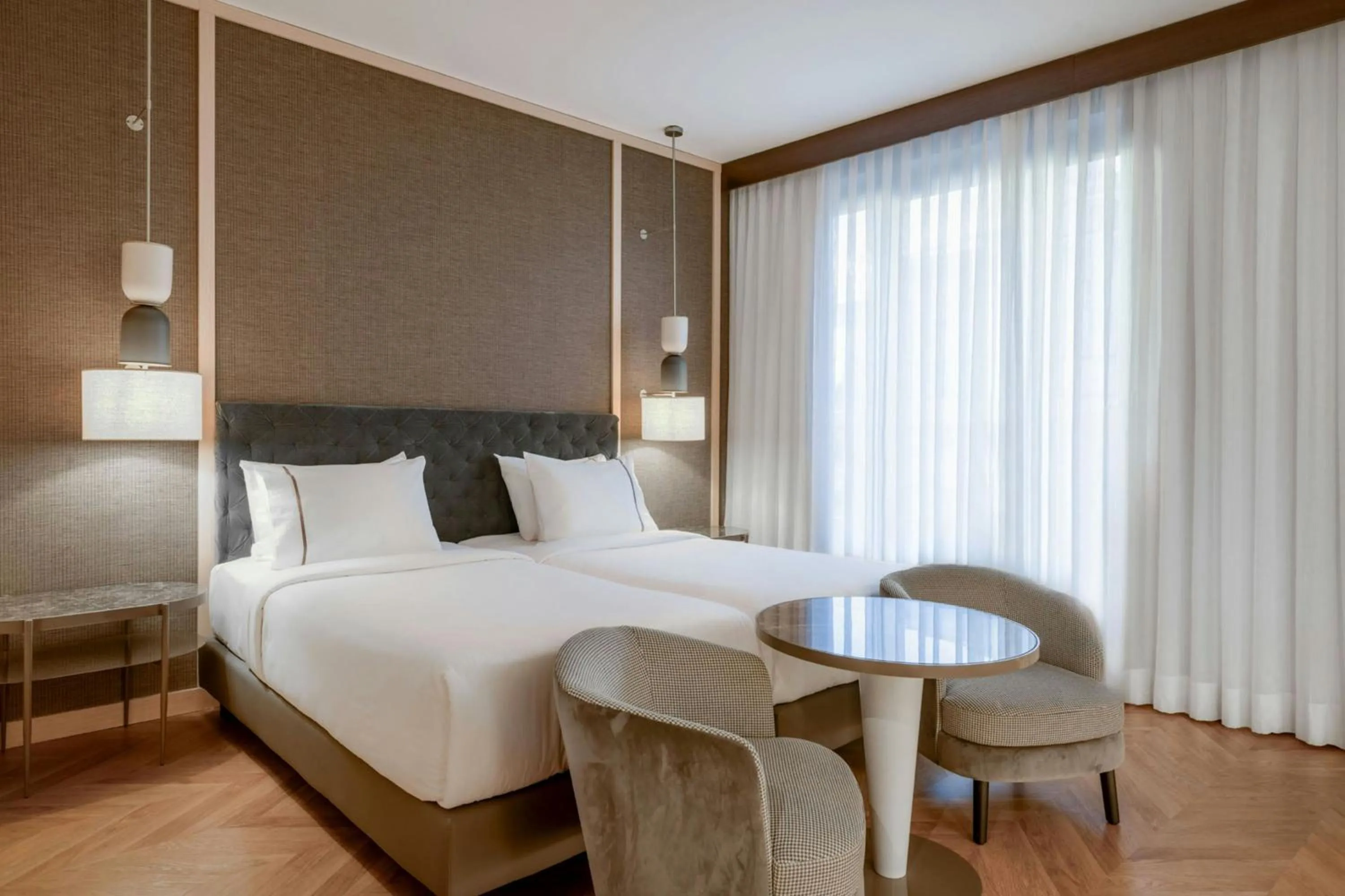 Photo of the whole room, Bed in AC Hotel Firenze by Marriott