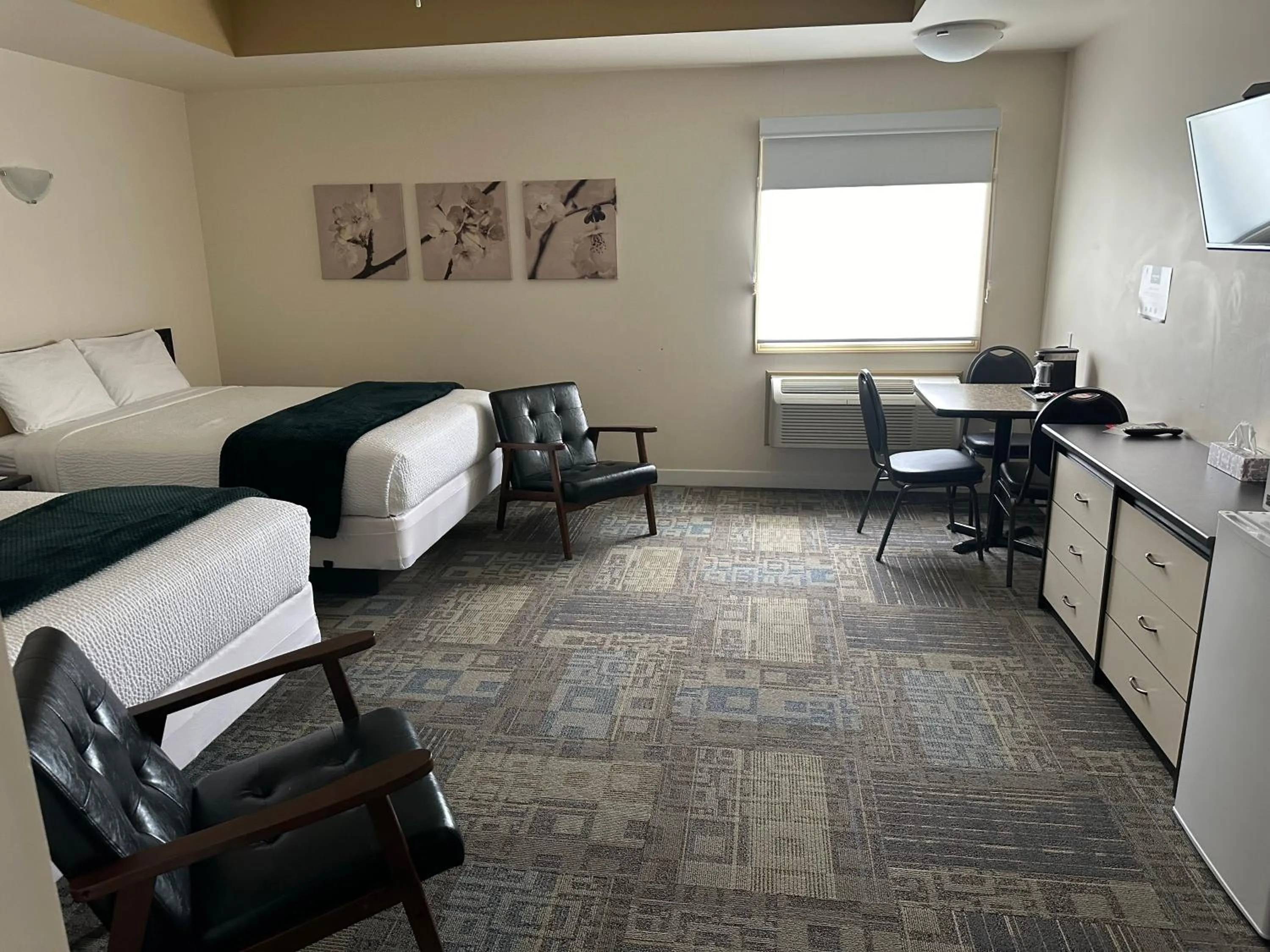 Bed in Sleep Suite Motel