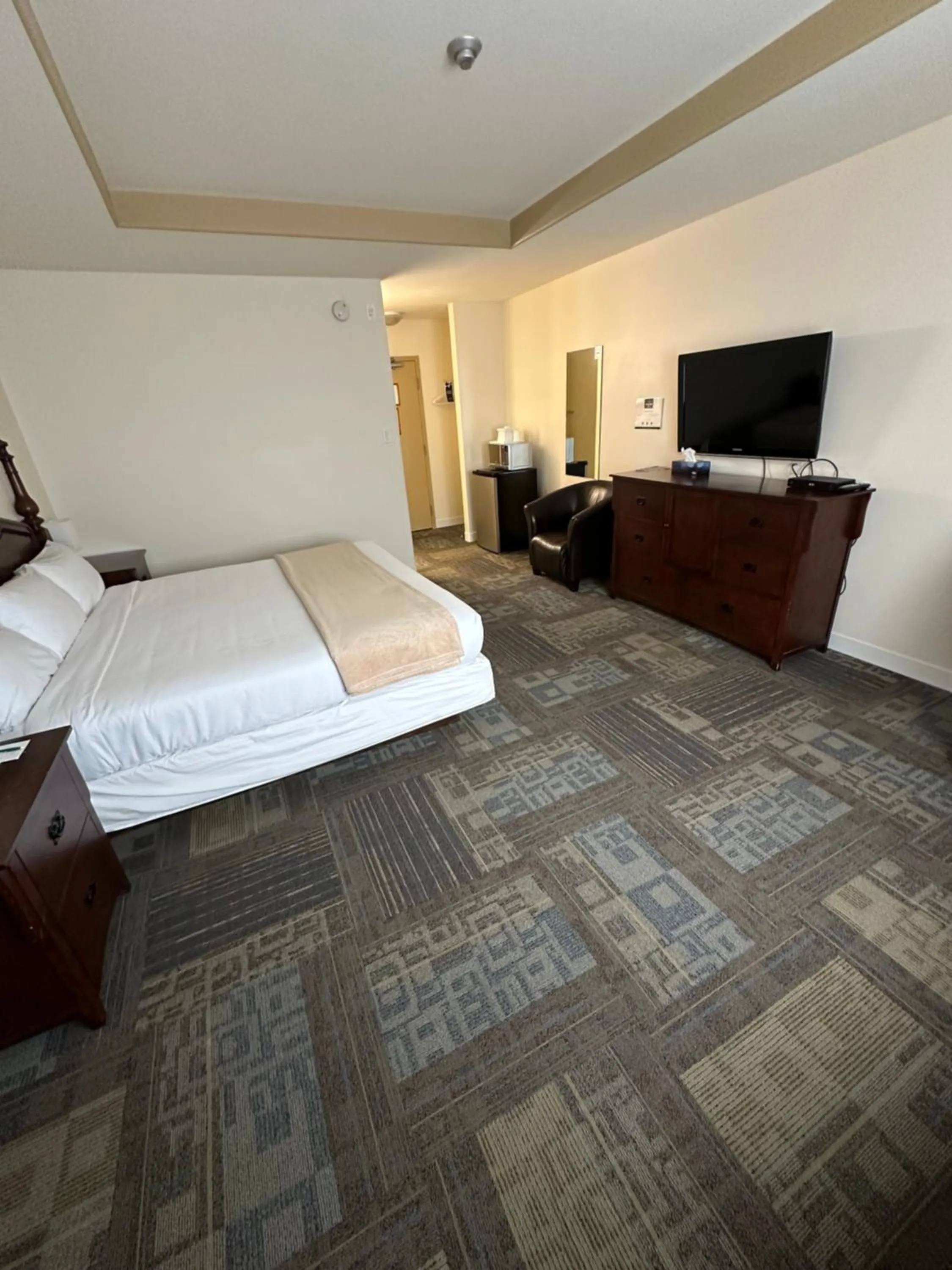 Bed in Sleep Suite Motel