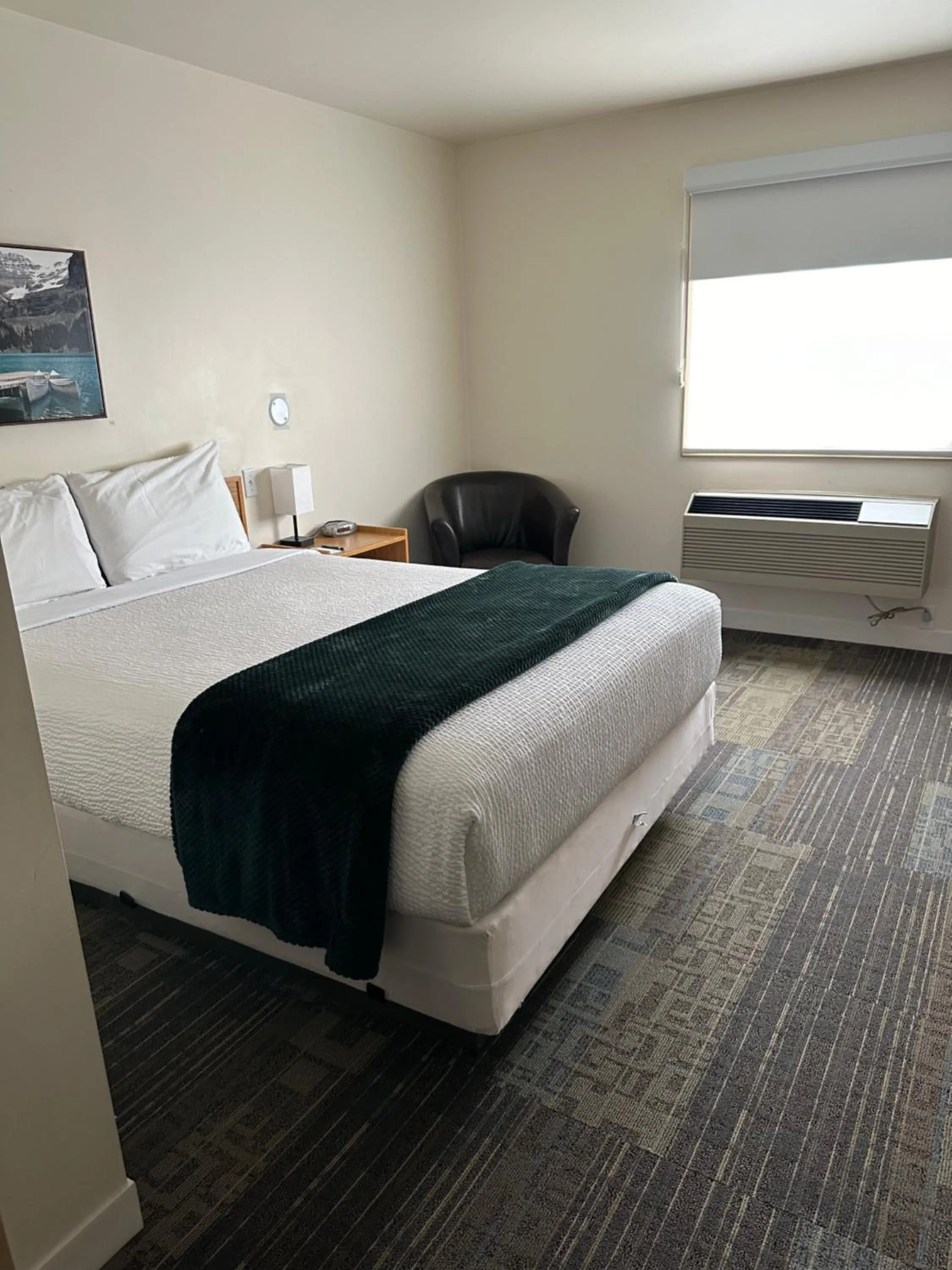 Bed in Sleep Suite Motel