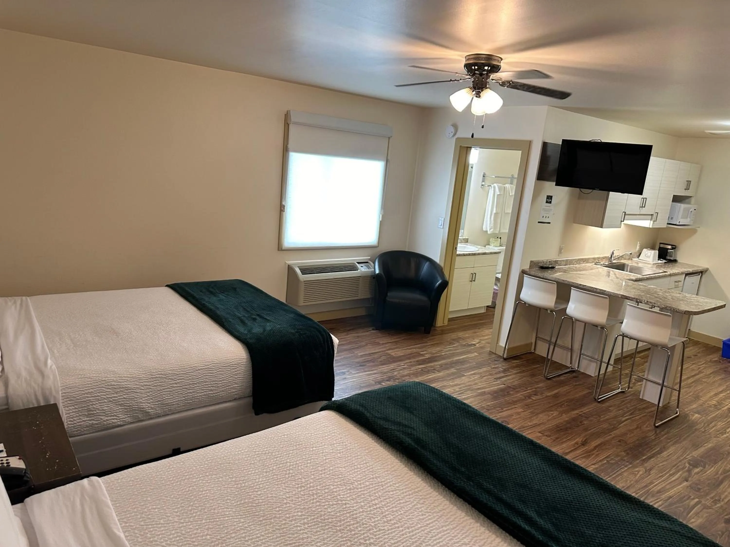 Bed in Sleep Suite Motel