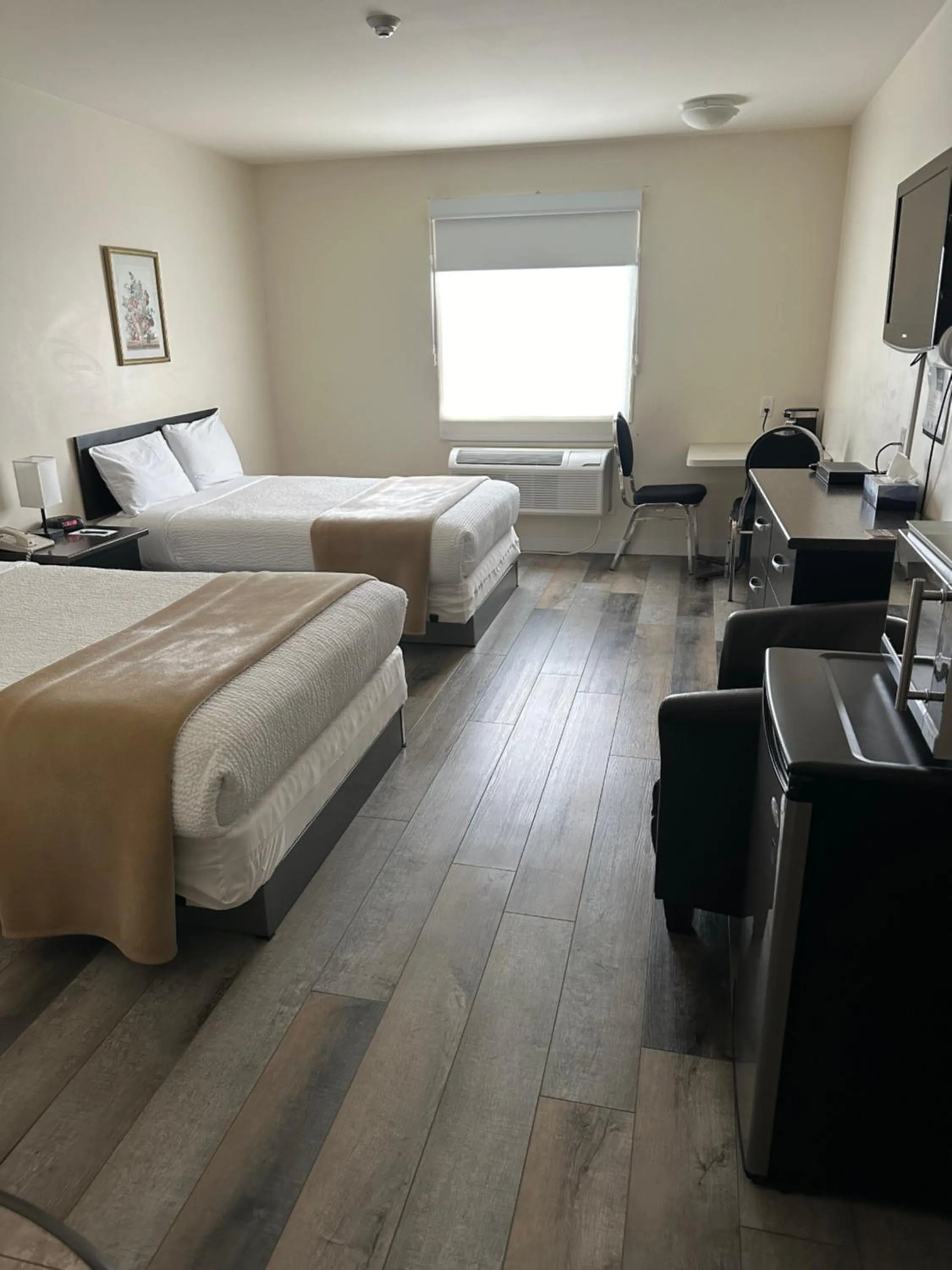 Bed in Sleep Suite Motel