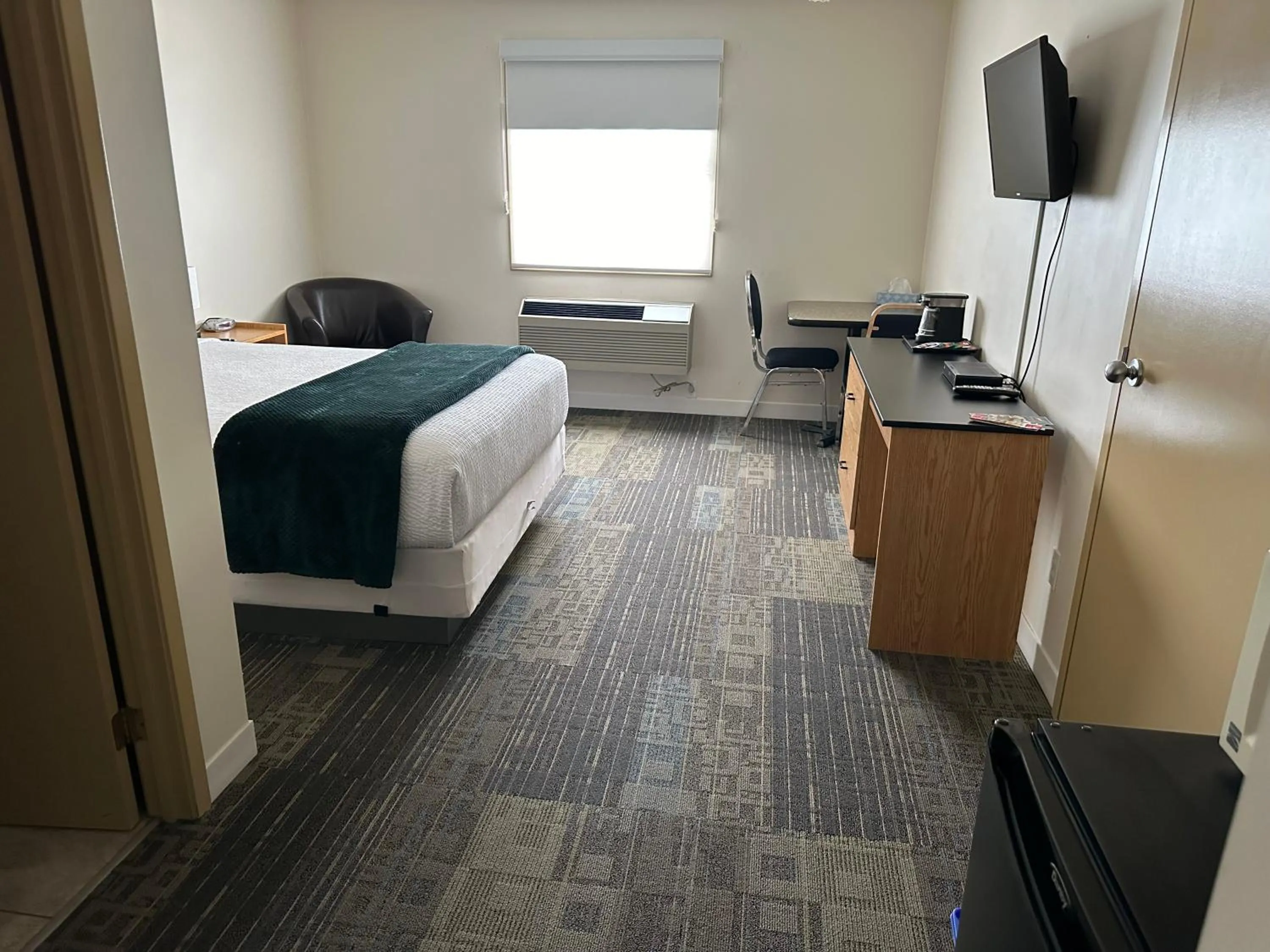 Bed in Sleep Suite Motel