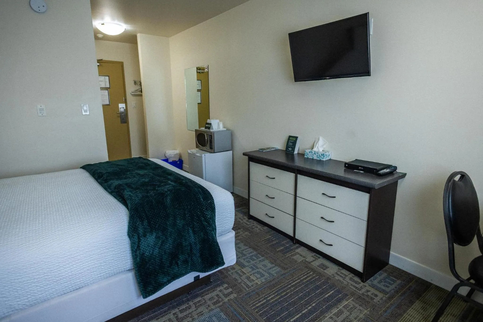 Bed in Sleep Suite Motel