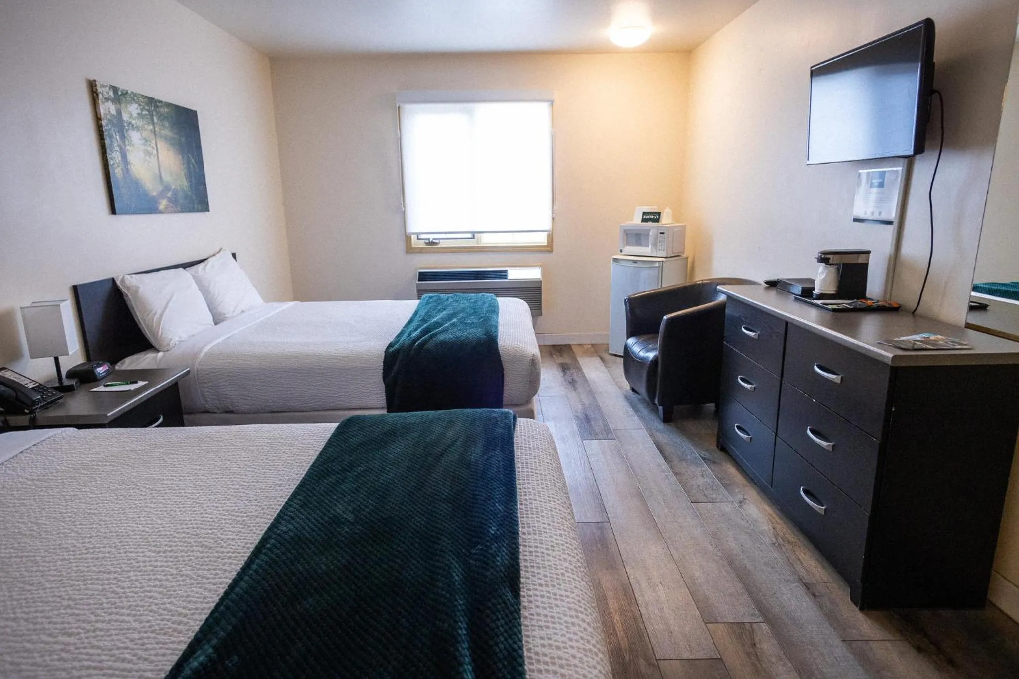 Bed in Sleep Suite Motel