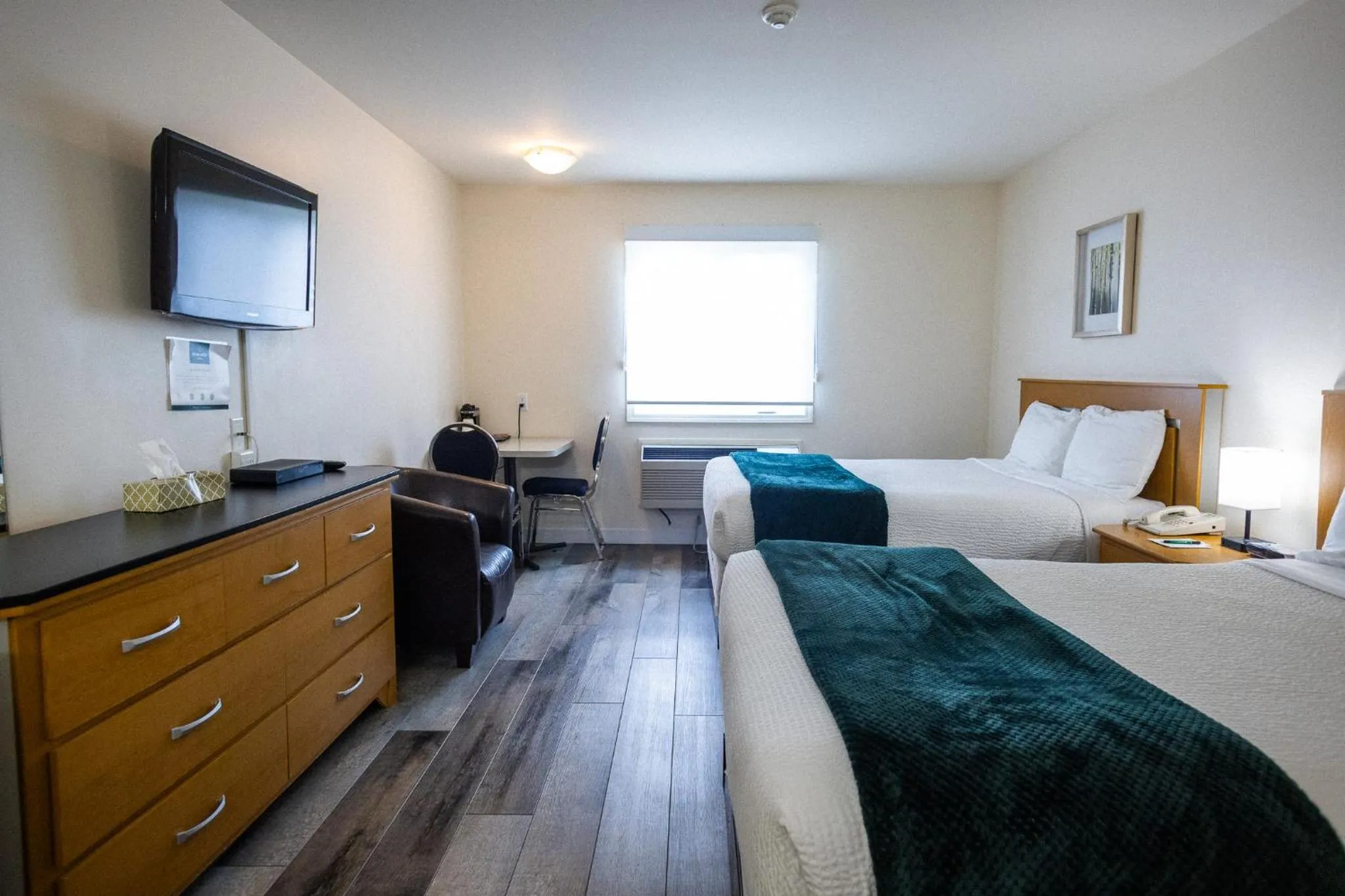 Bed in Sleep Suite Motel