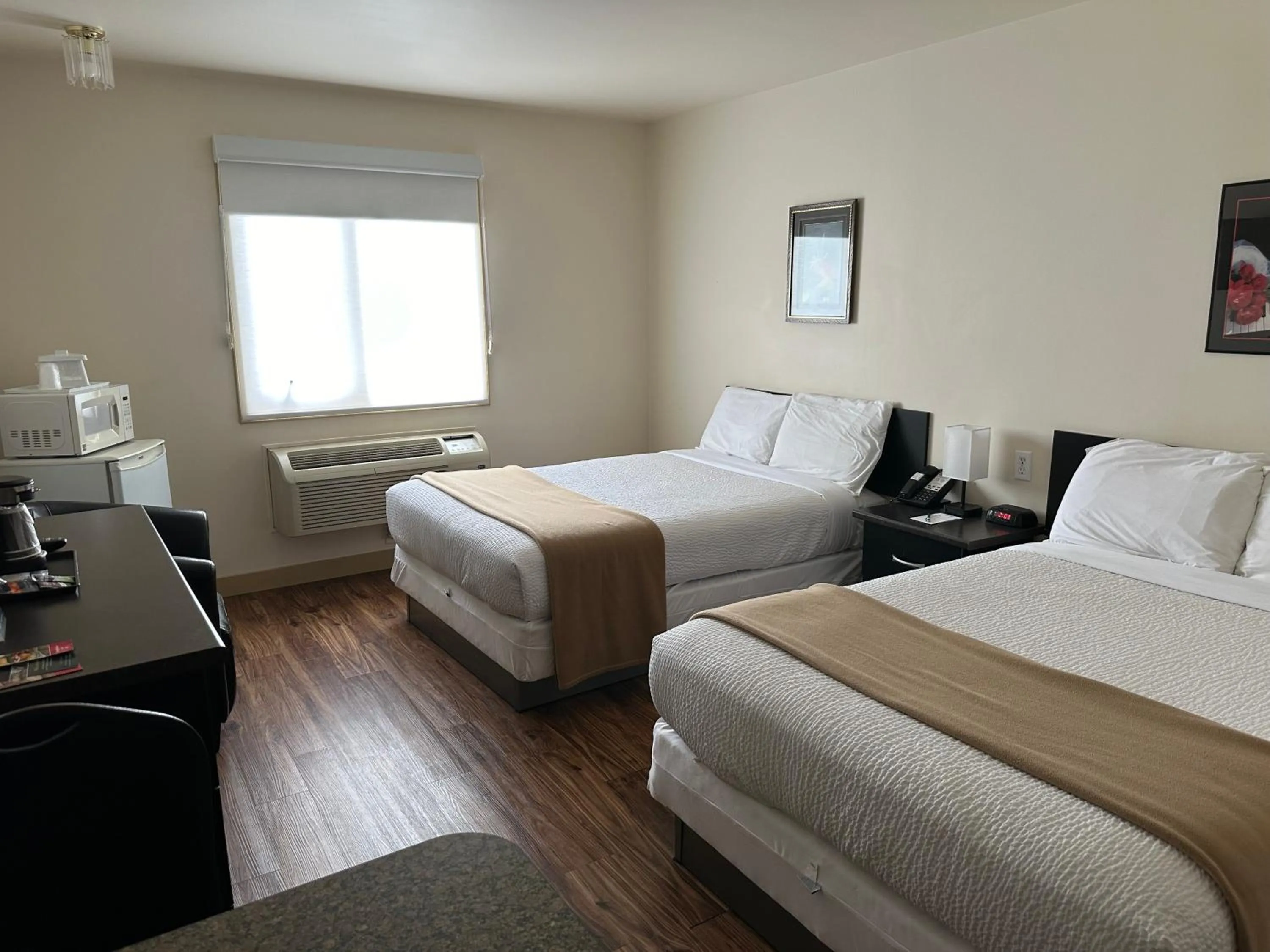 Bed in Sleep Suite Motel