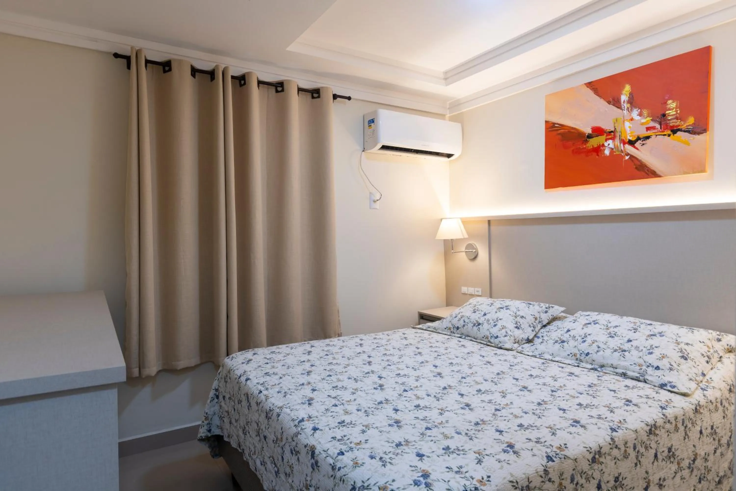 Bed in Bombinhas Tourist Apart