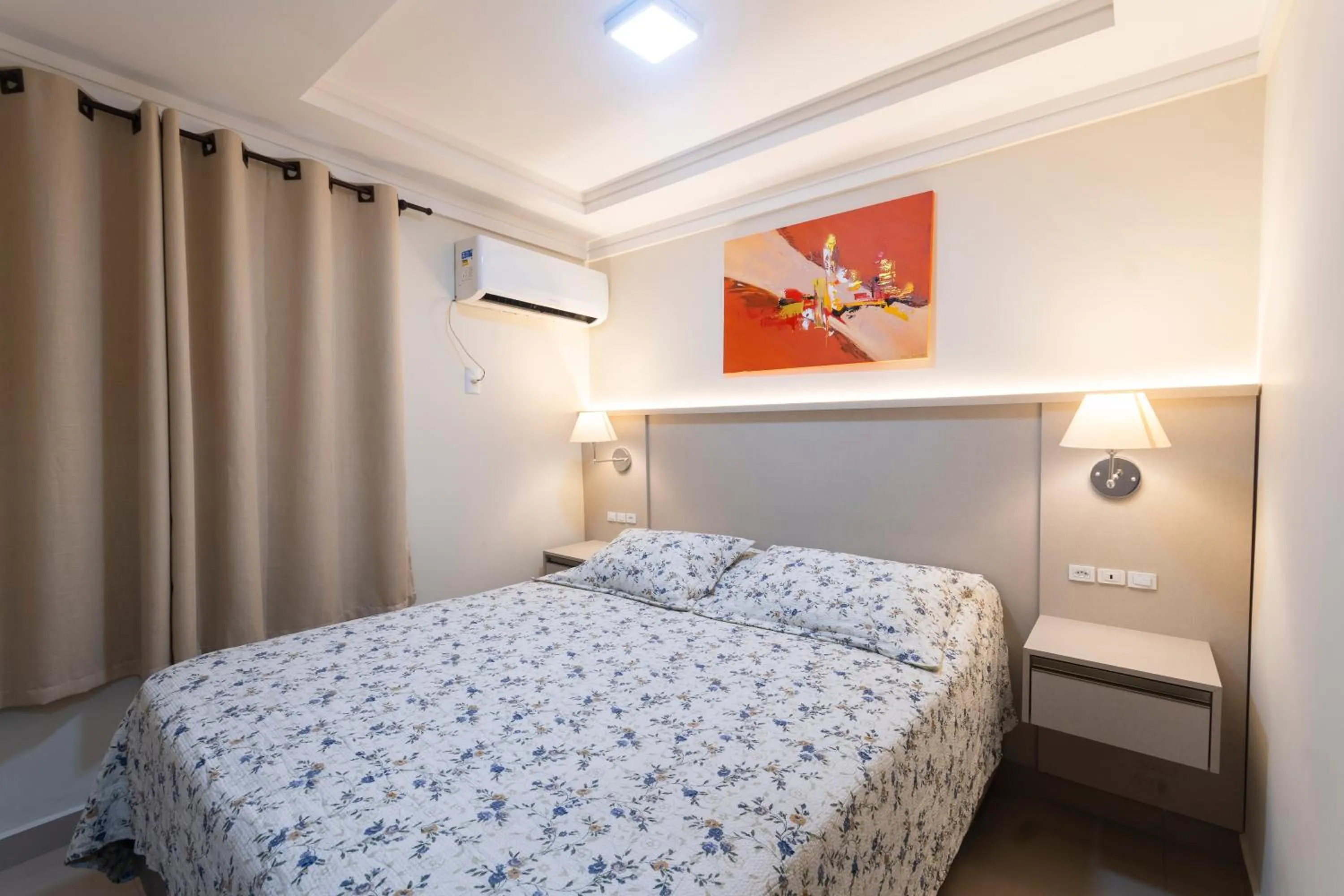 Bed in Bombinhas Tourist Apart