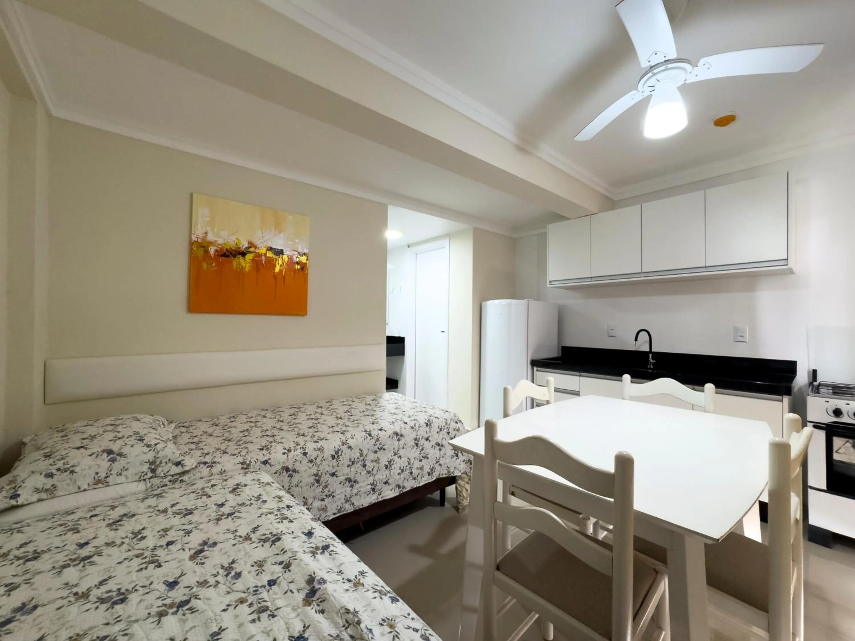 Bed in Bombinhas Tourist Apart