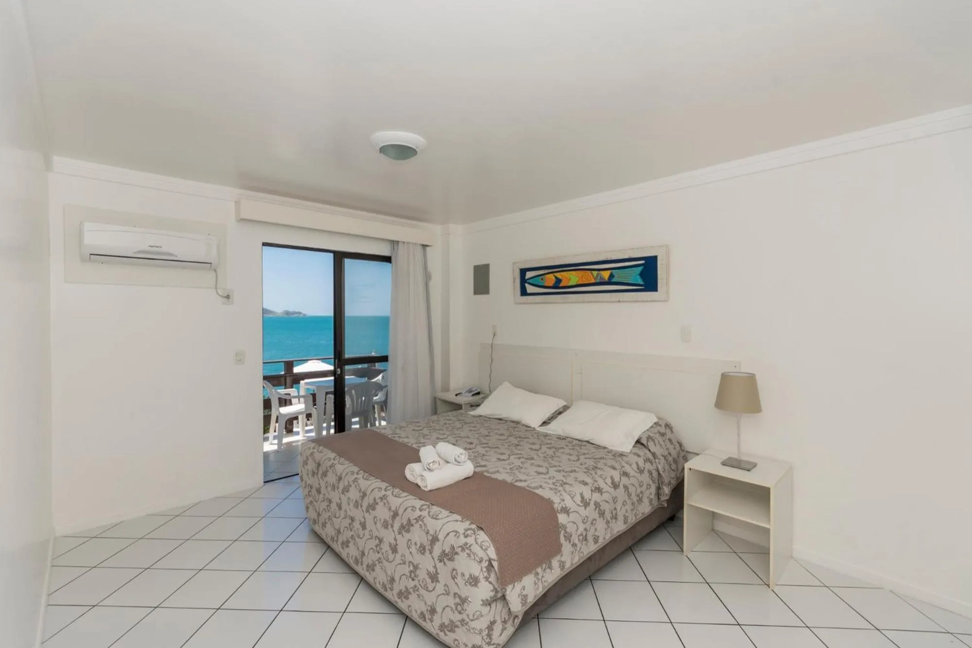 View (from property/room), Bed in Bombinhas Tourist Apart