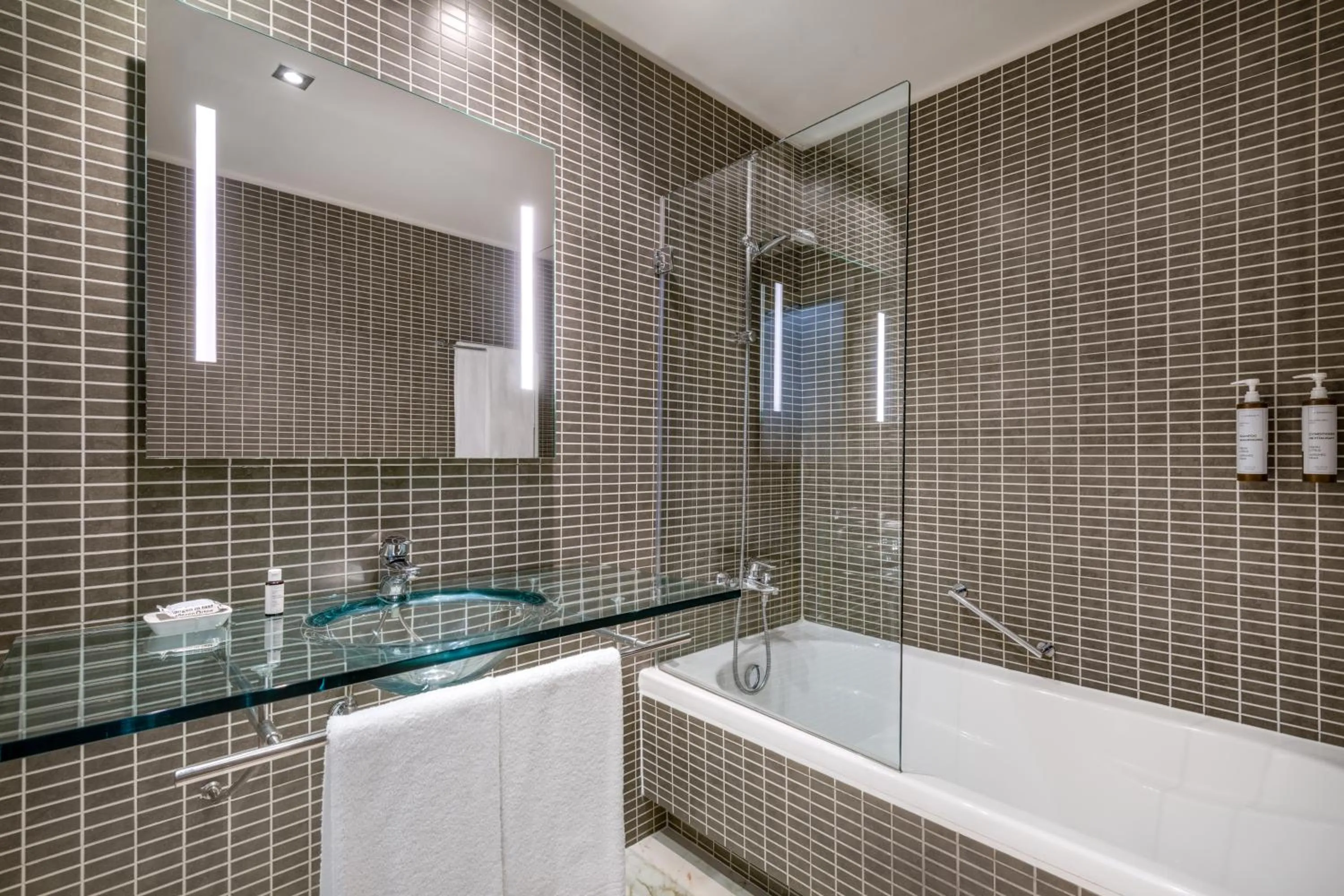 Bathroom in AC Hotel Milano by Marriott