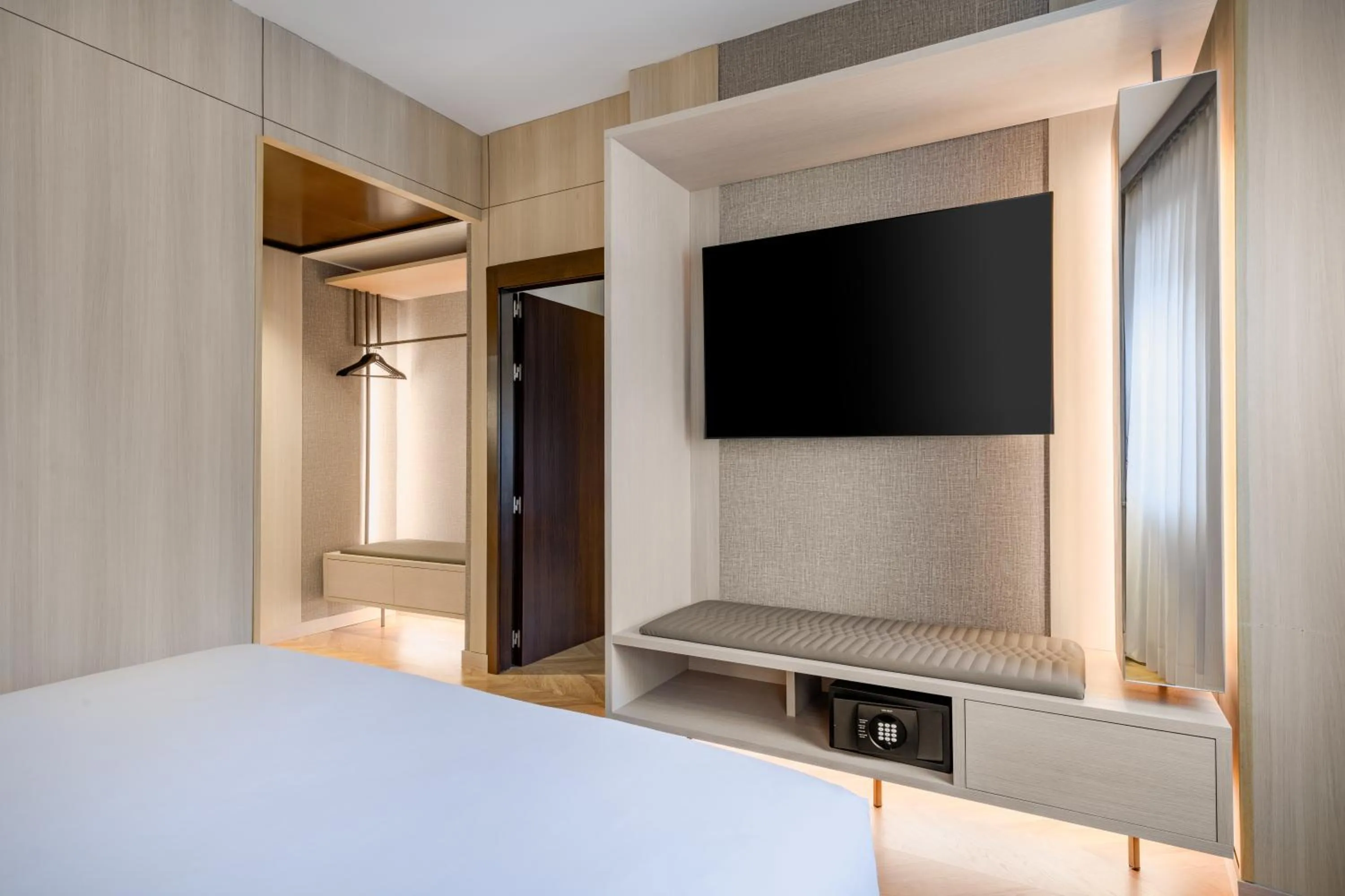 Communal lounge/ TV room, Bed in AC Hotel Milano by Marriott