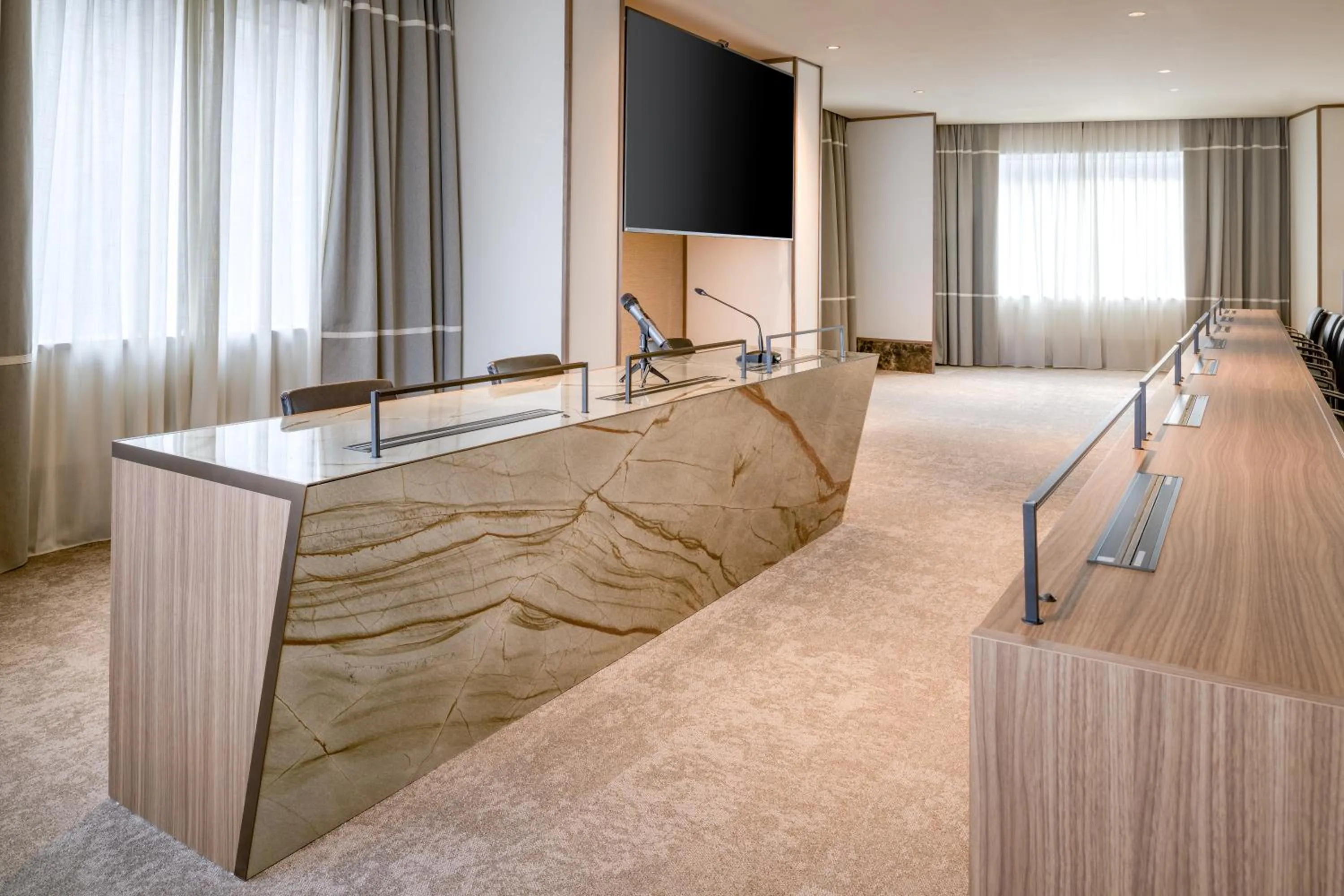 Seating area in AC Hotel Milano by Marriott