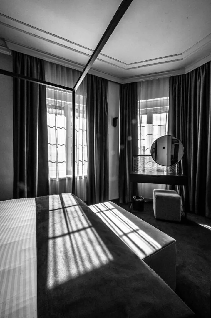 Bed in ArtLoft Garni Hotel