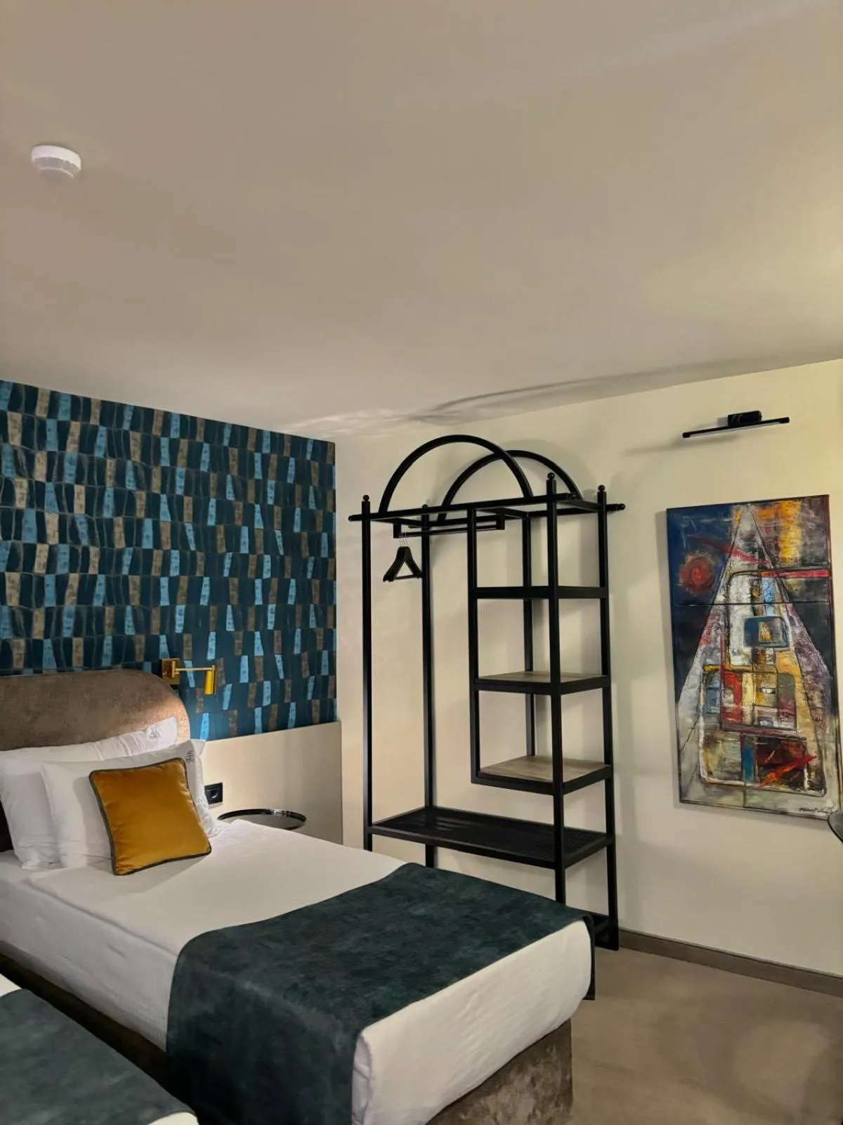 Bed in ArtLoft Garni Hotel